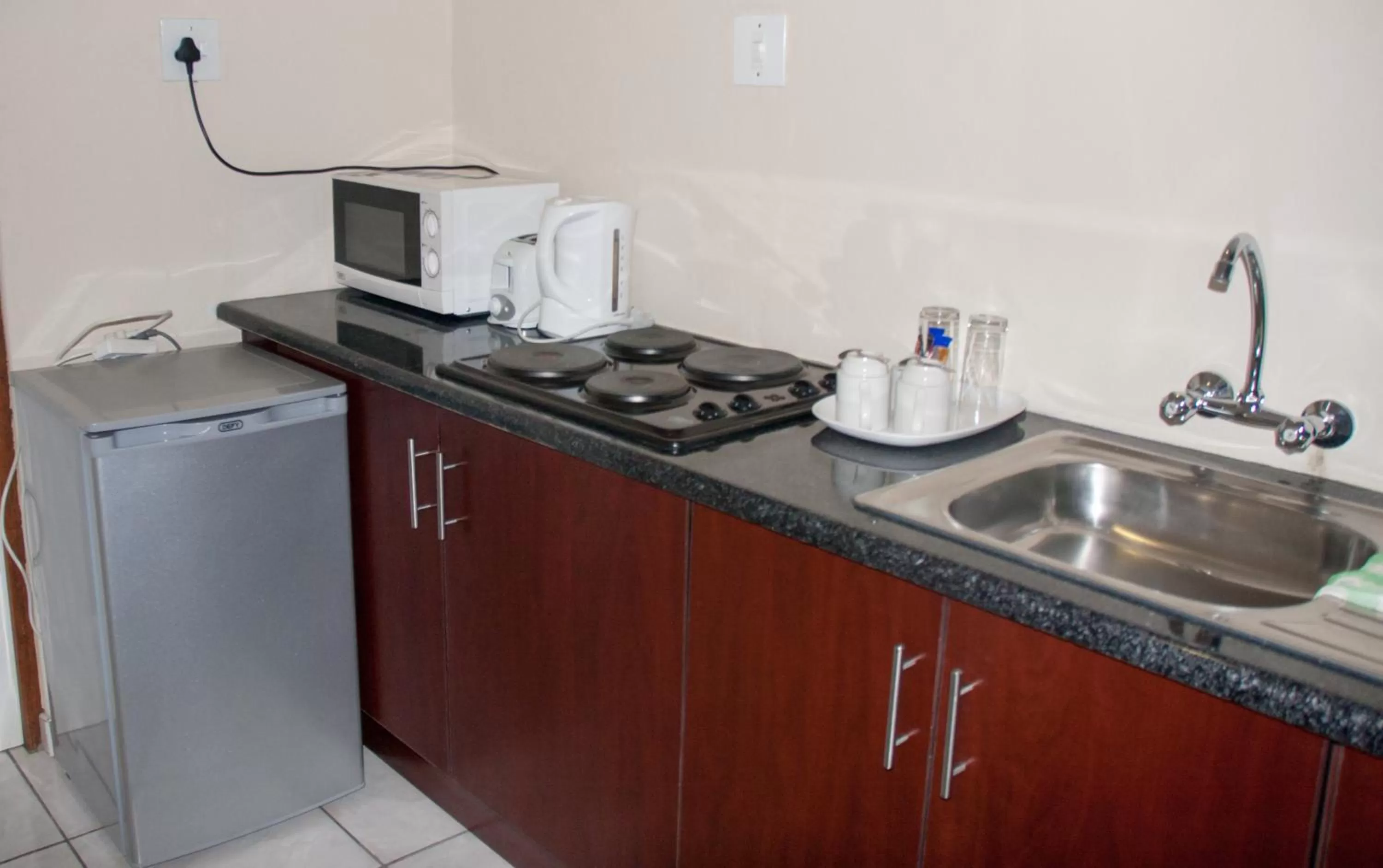 Kitchen or kitchenette in Tribute Guest House Matala