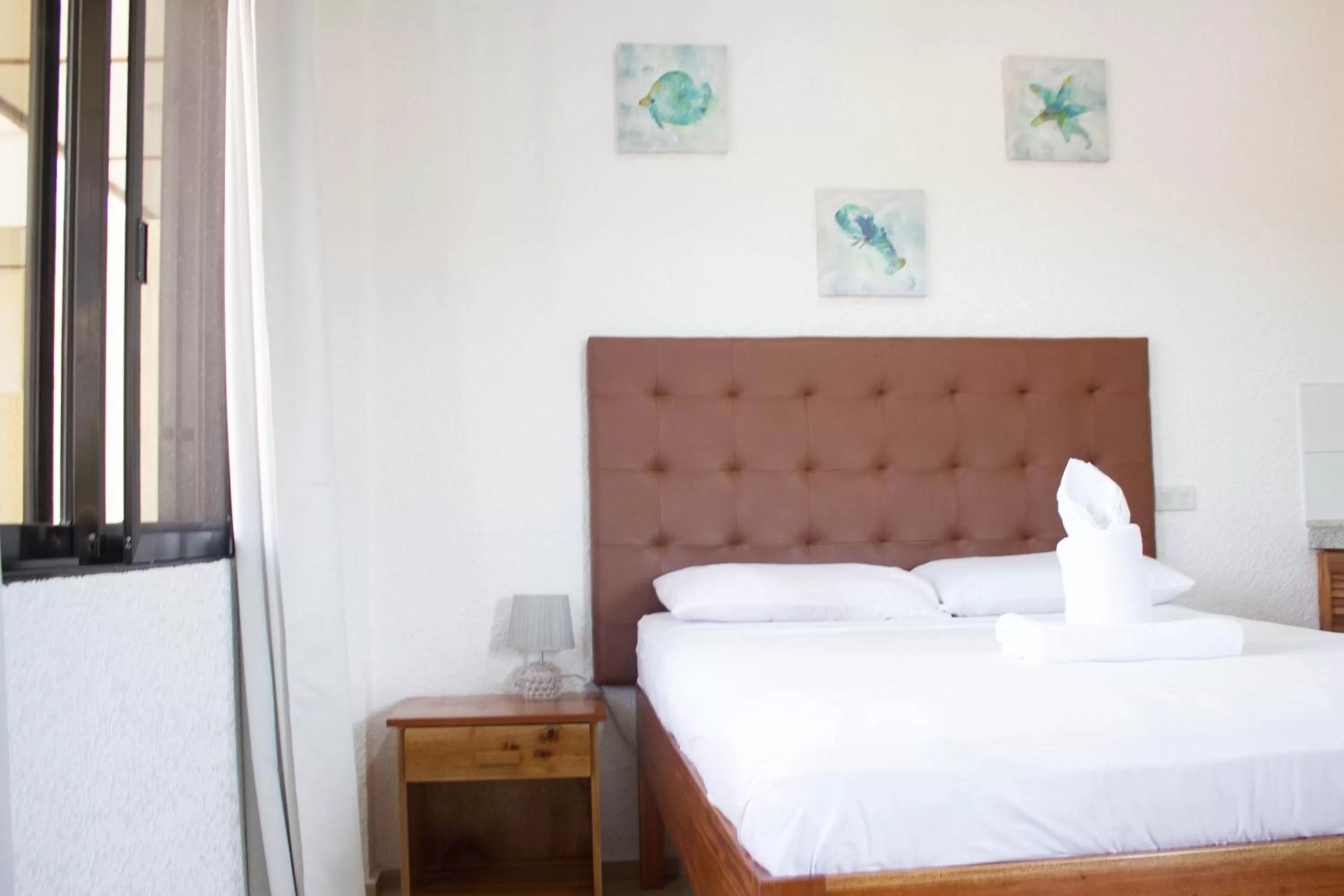 Bed in Jugalis Hotel and Restaurant