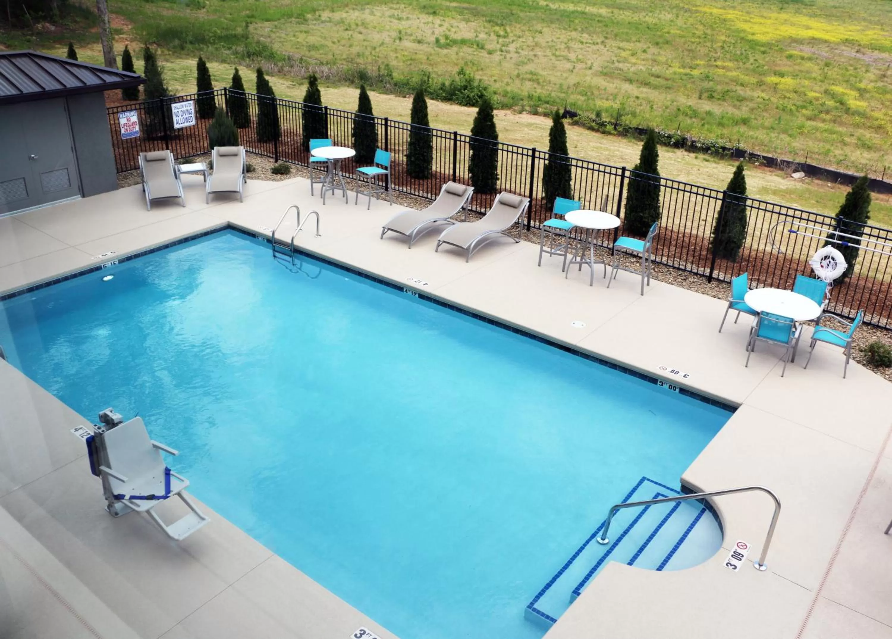 Swimming pool in Holiday Inn Express & Suites - Hendersonville SE - Flat Rock by IHG