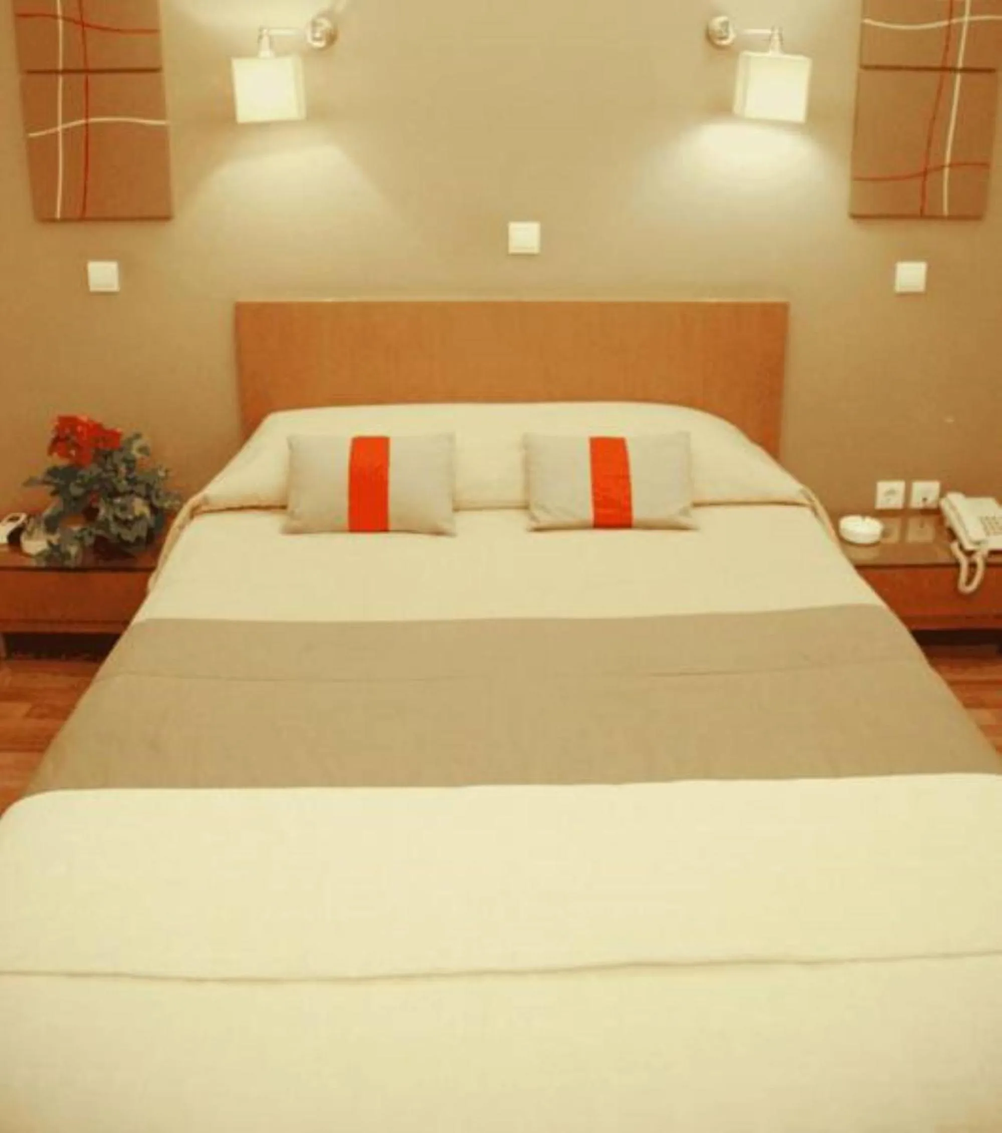 Bed in Ariston Hotel