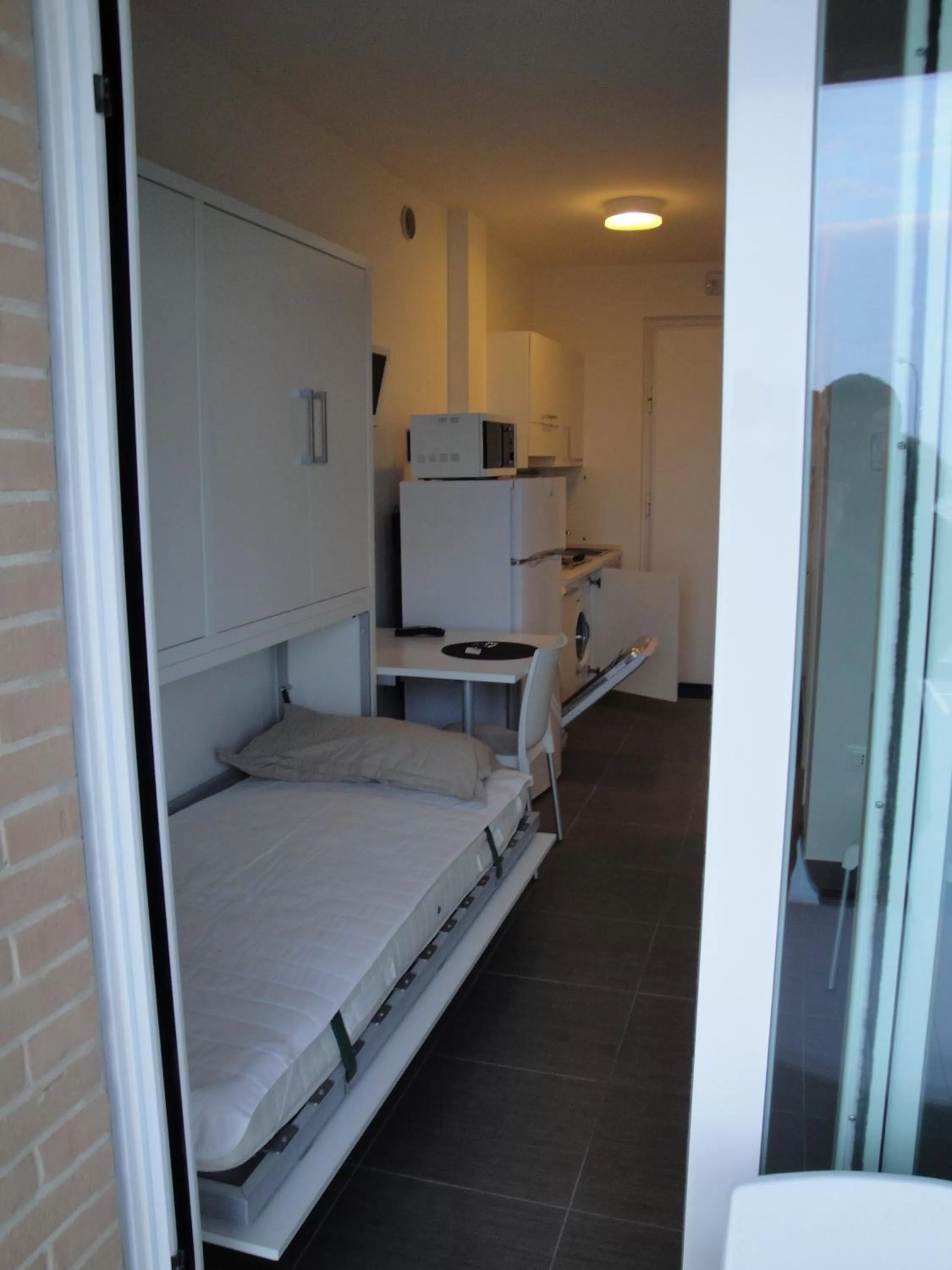 Photo of the whole room, Bed in Residence La Nave