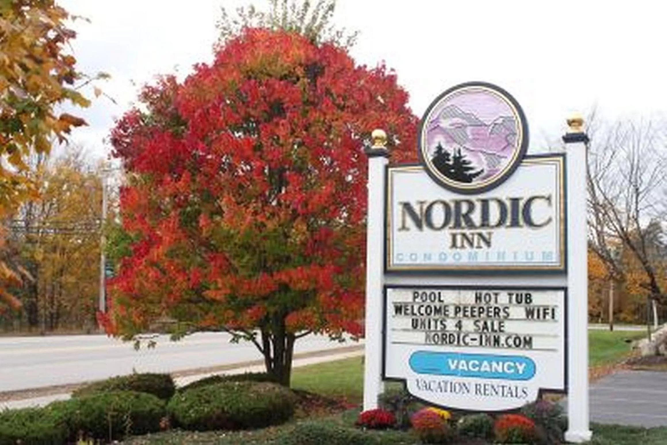 Property logo or sign in Nordic Inn Condominium Resort