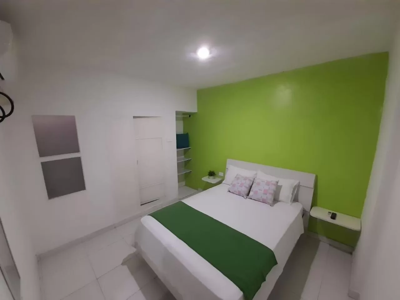 Bed in Tita’s Airport Hotel