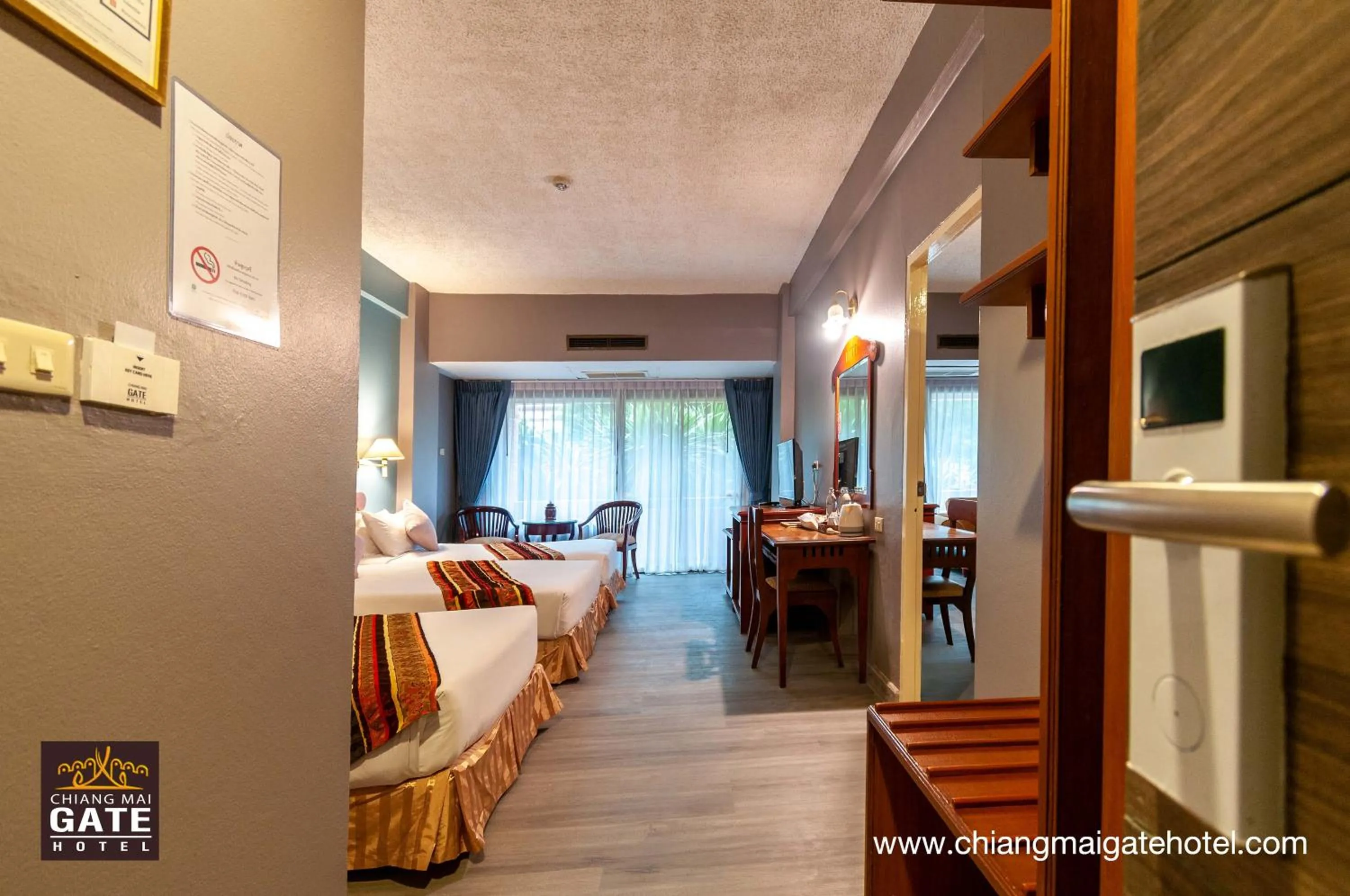 Bed in Chiangmai Gate Hotel