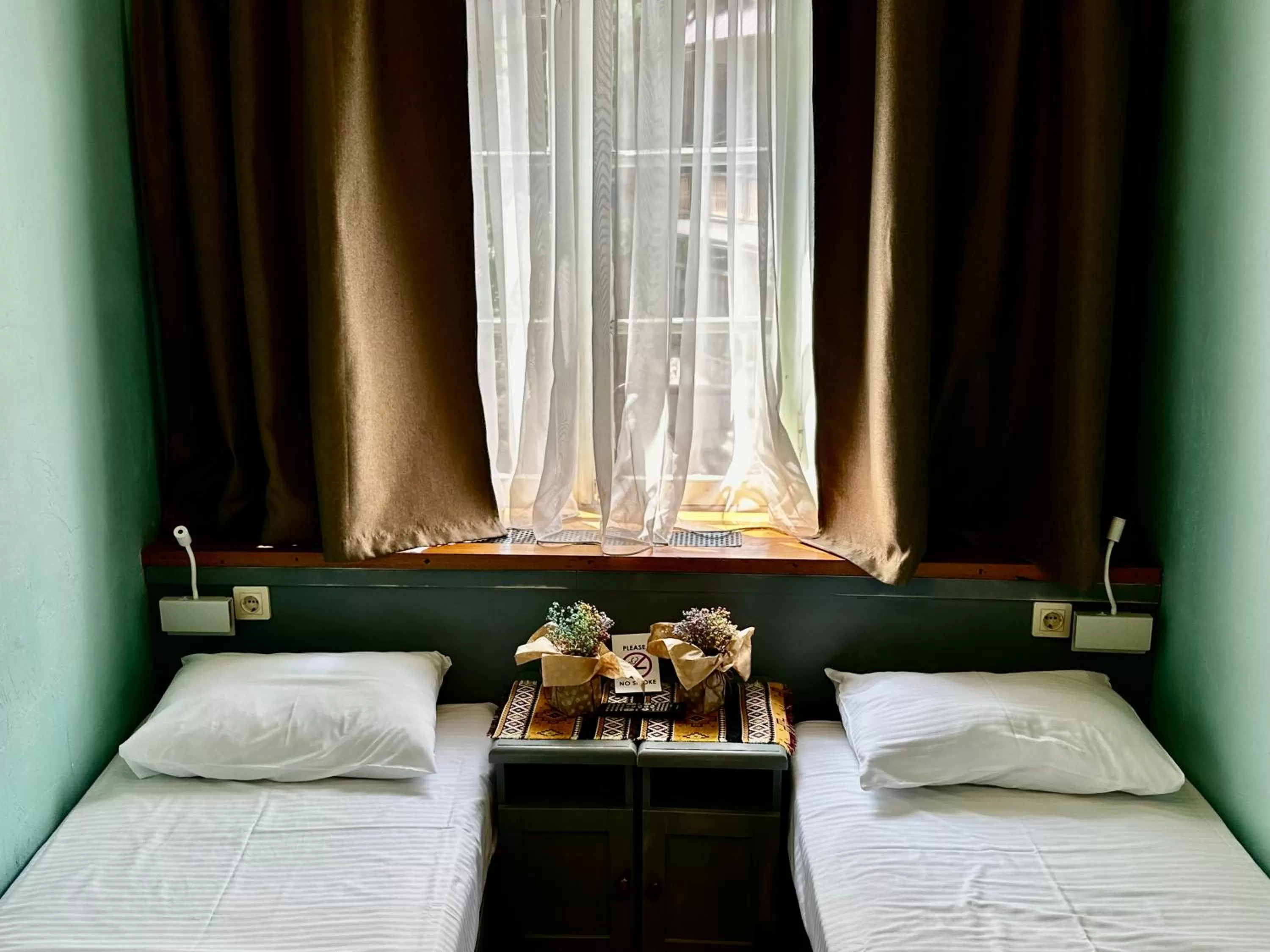 Bed in Kindli Boutique Hotel