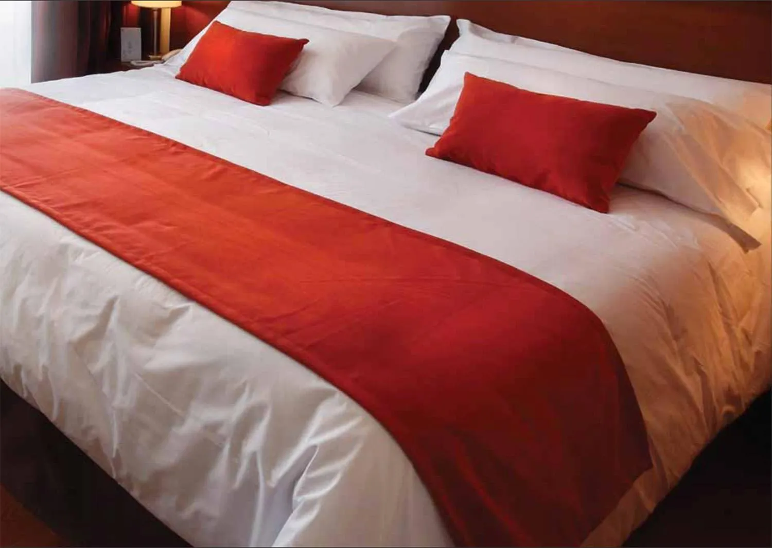 Bed in Herradura Hotel Suites