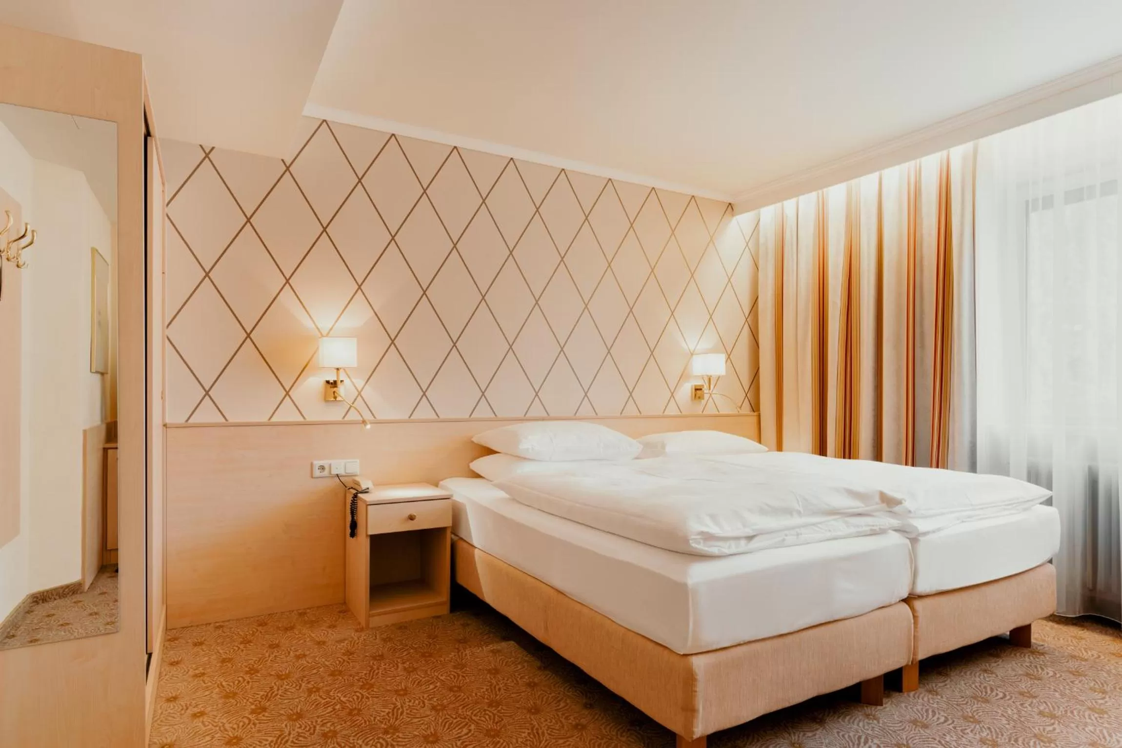 Bed in Hotel Scherer