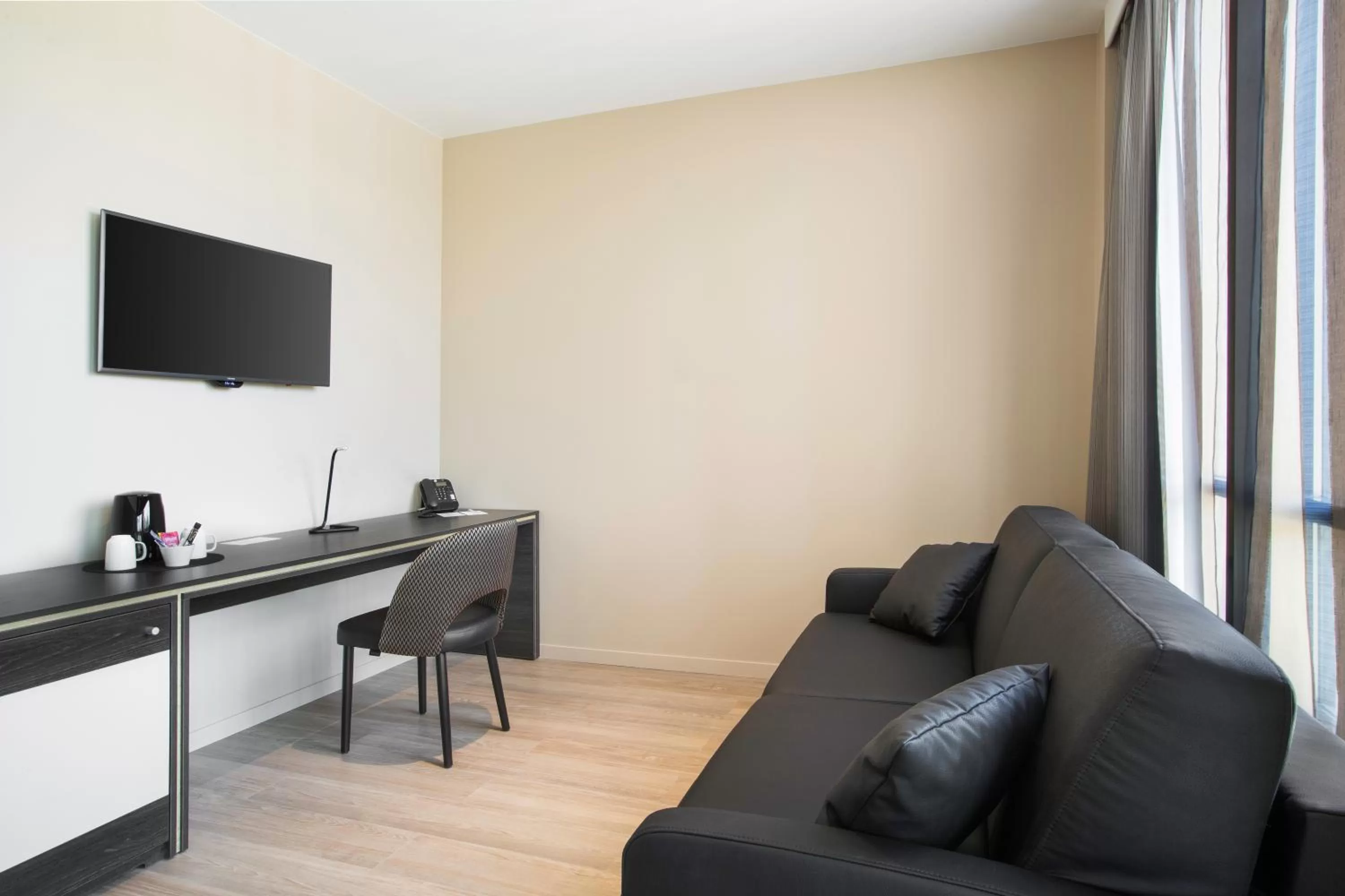 Living room in Best Western Plus Hôtel Escapade Senlis