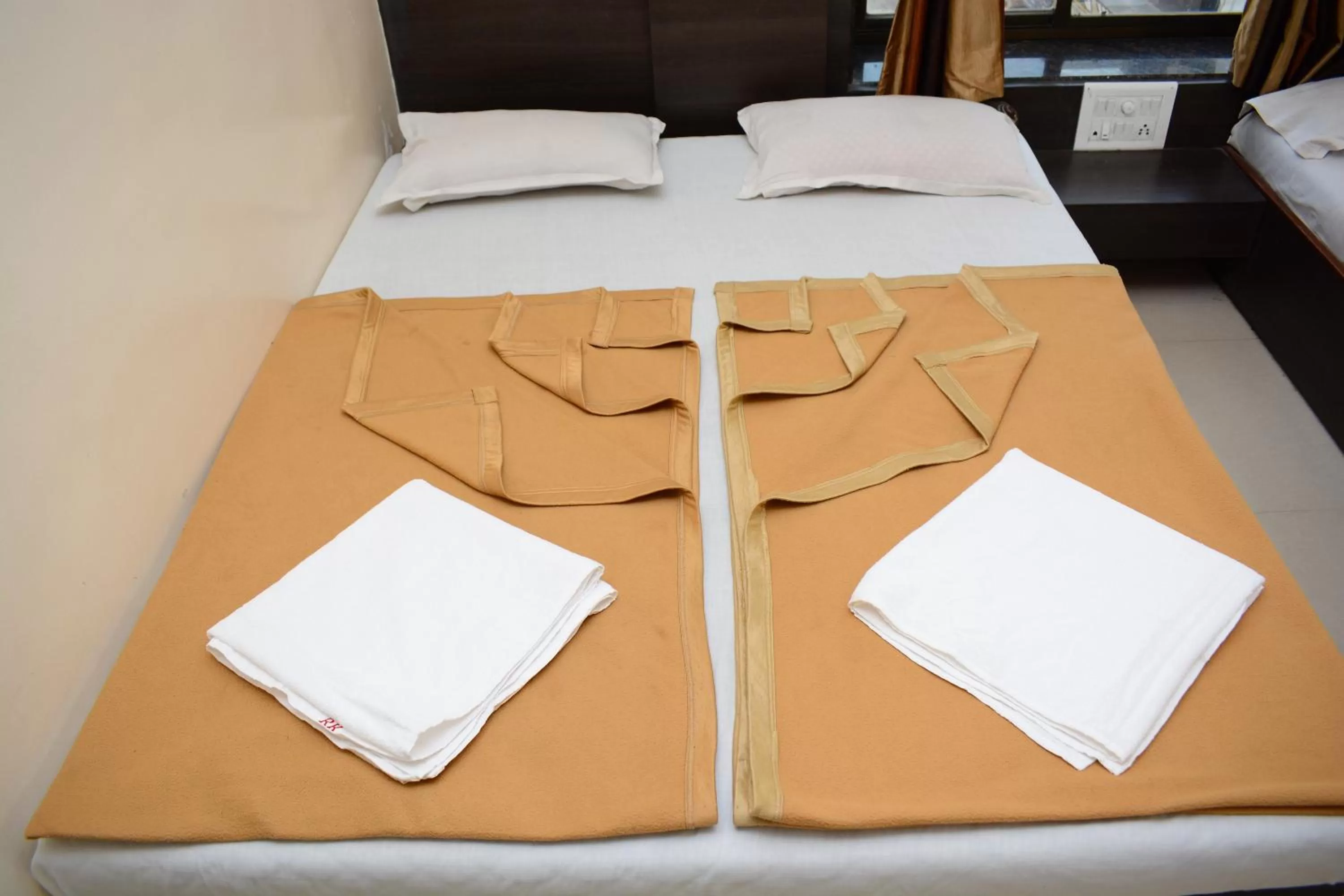 Bed in Hotel Sai Sampada NX