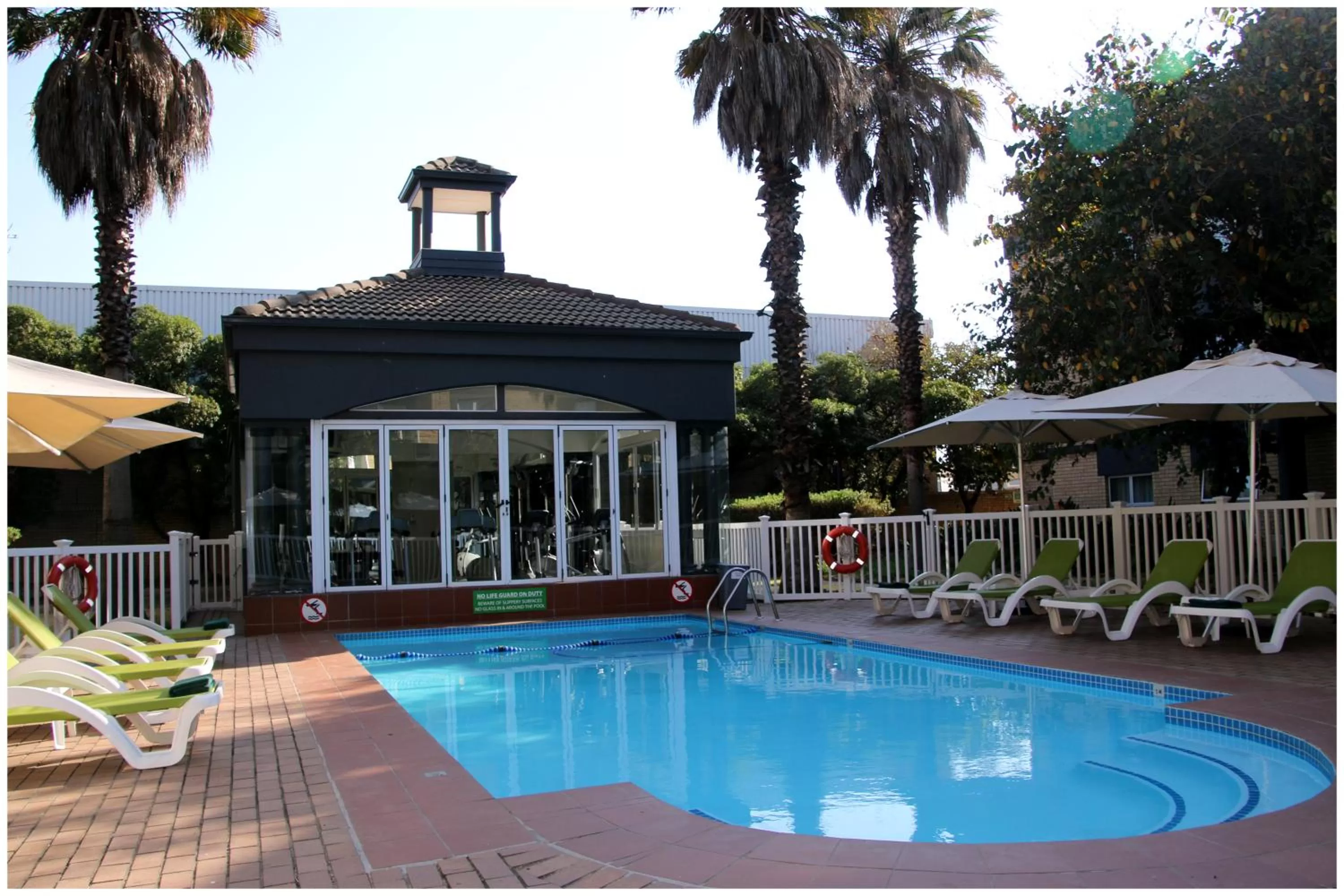 Pool view in Holiday Inn Johannesburg OR Tambo Airport Hotel by IHG