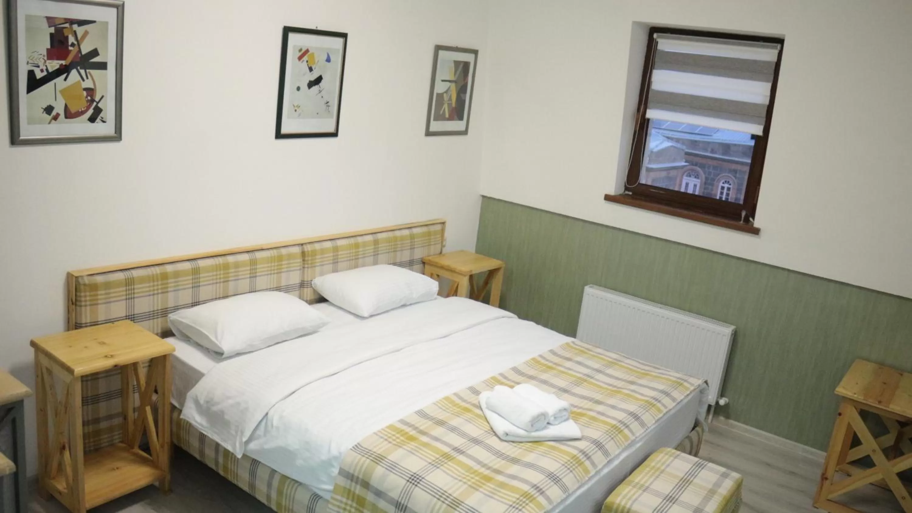 Bed in 21 Rooms Hotel