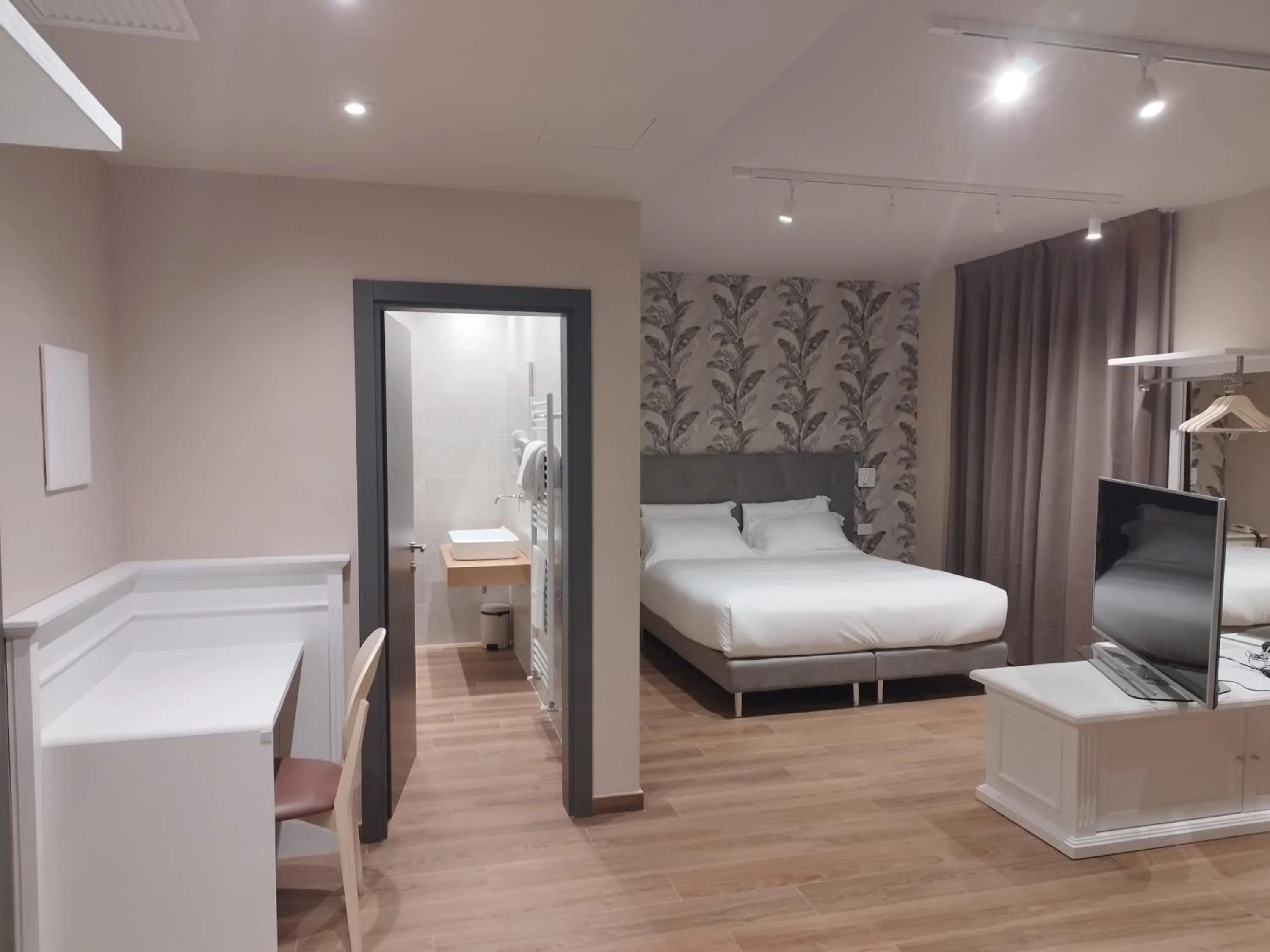 Bed in Campiglione Hotel