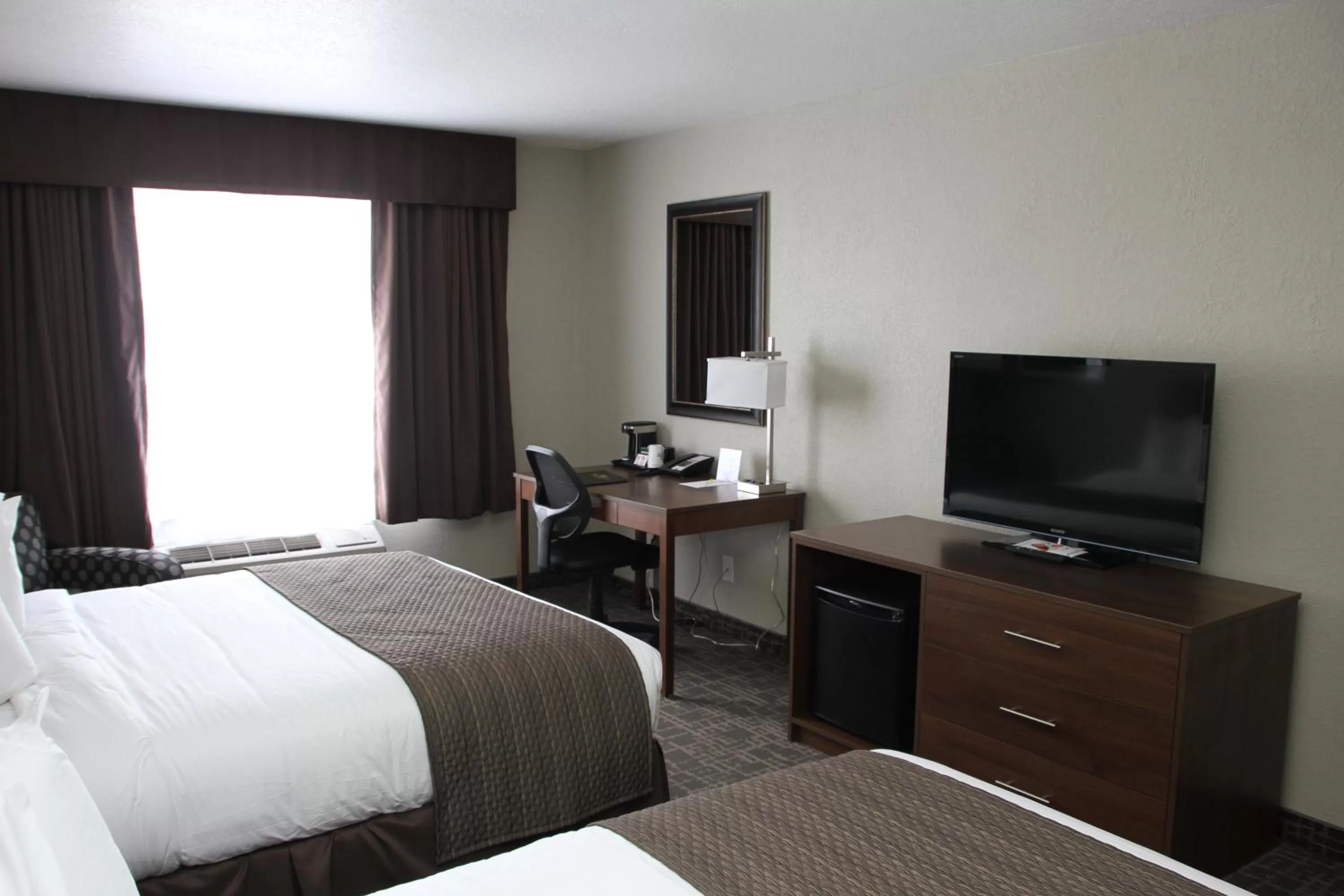 Photo of the whole room, Bed in Days Inn & Suites by Wyndham Yorkton