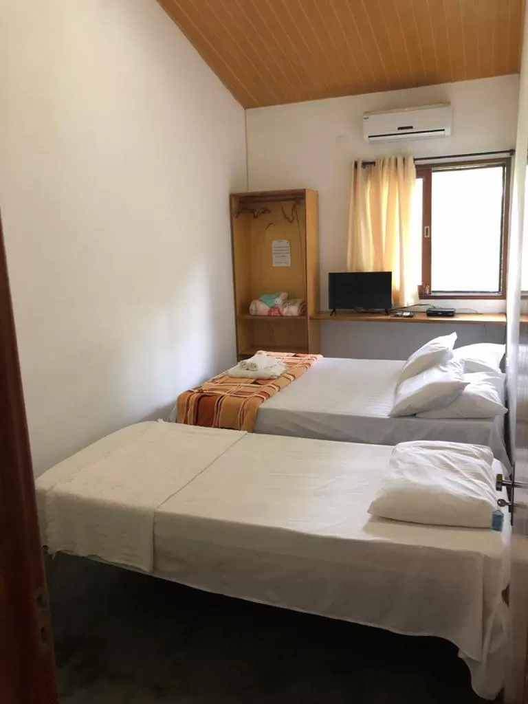Bed in Pousada Aba da Serra