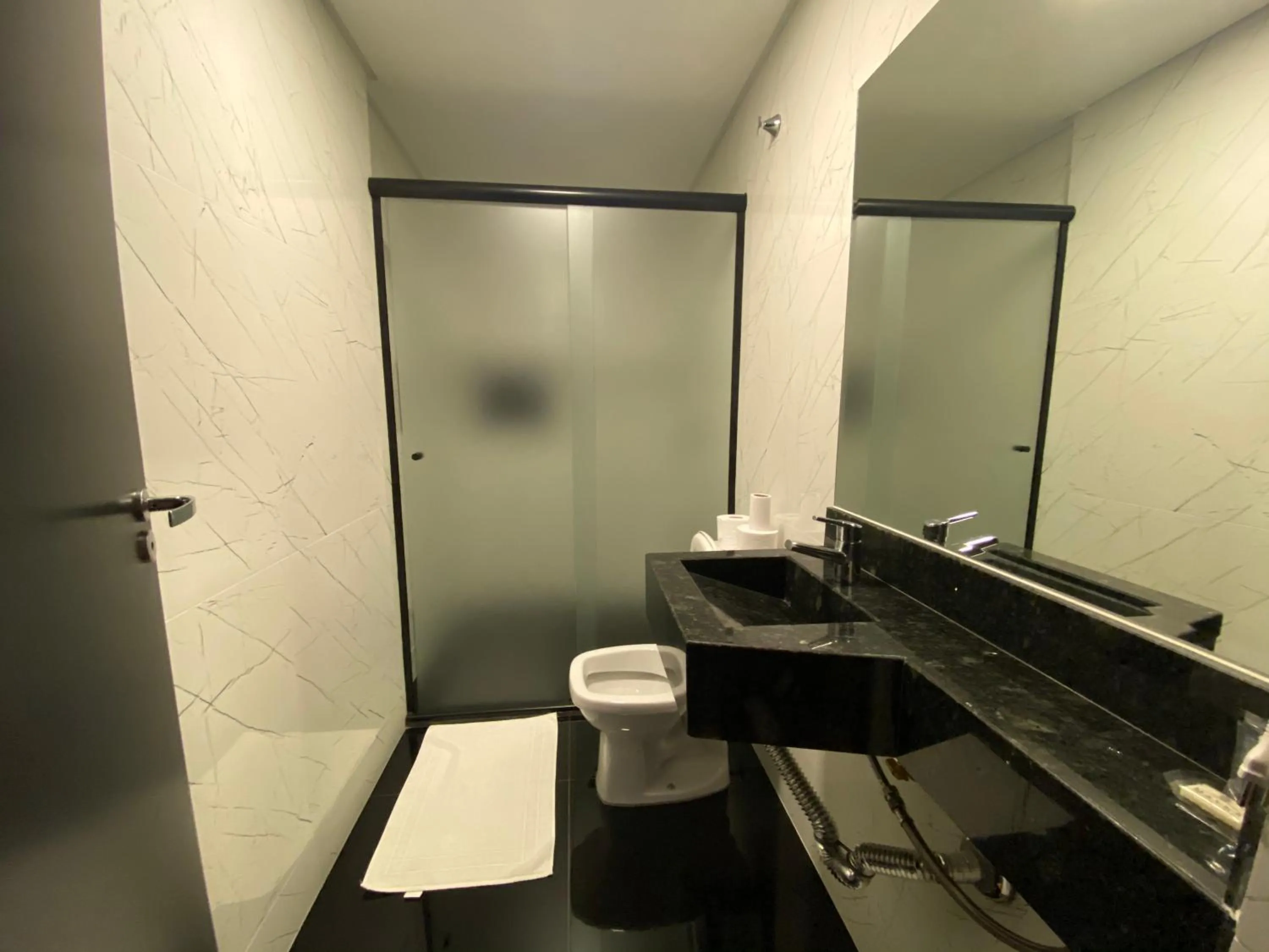 Bathroom in Mayná Hotel Prudentópolis Centro