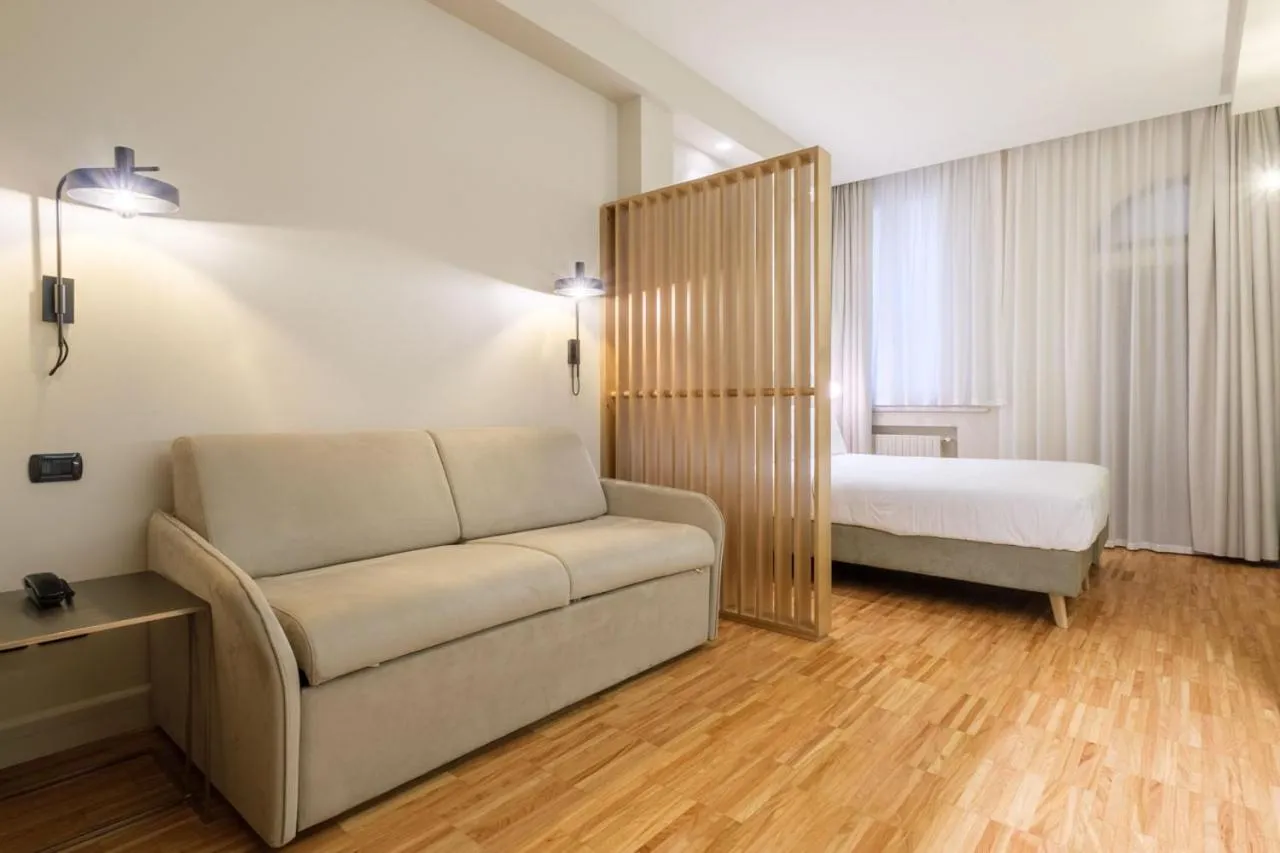 Bed in Hotel Touring