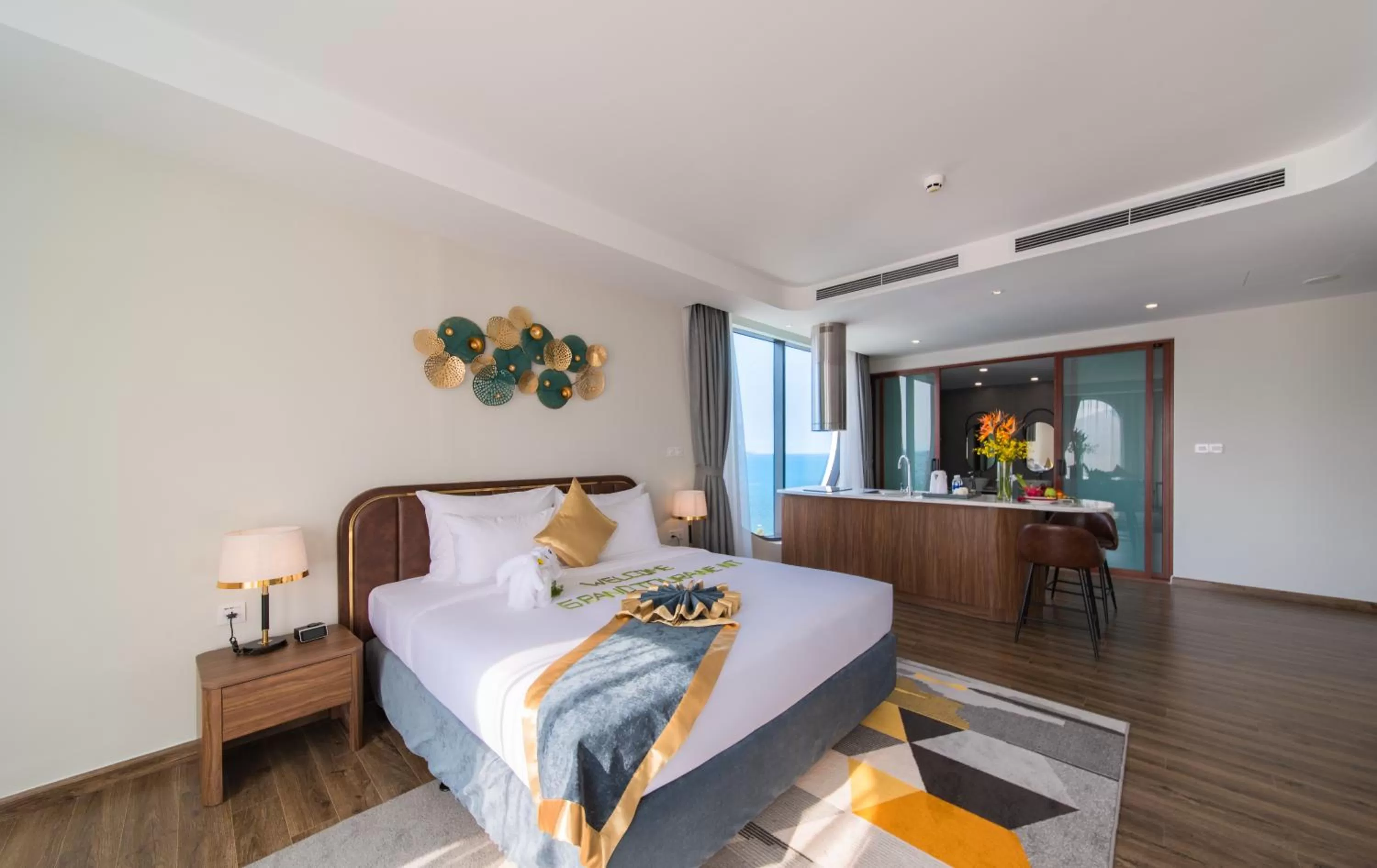 Kitchen or kitchenette, Bed in Grand Tourane Nha Trang Hotel
