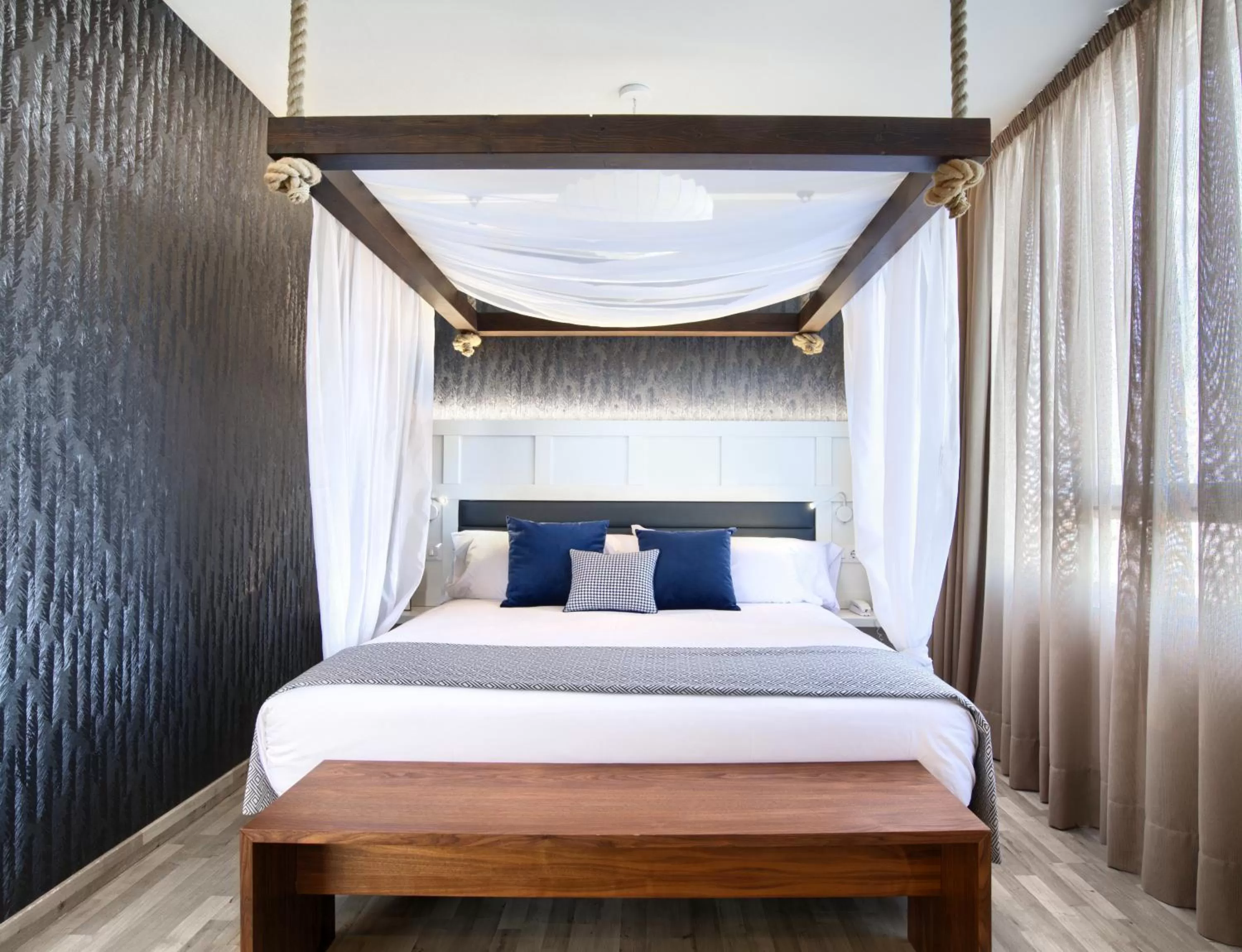 Bed in Hotel Luze El Villa