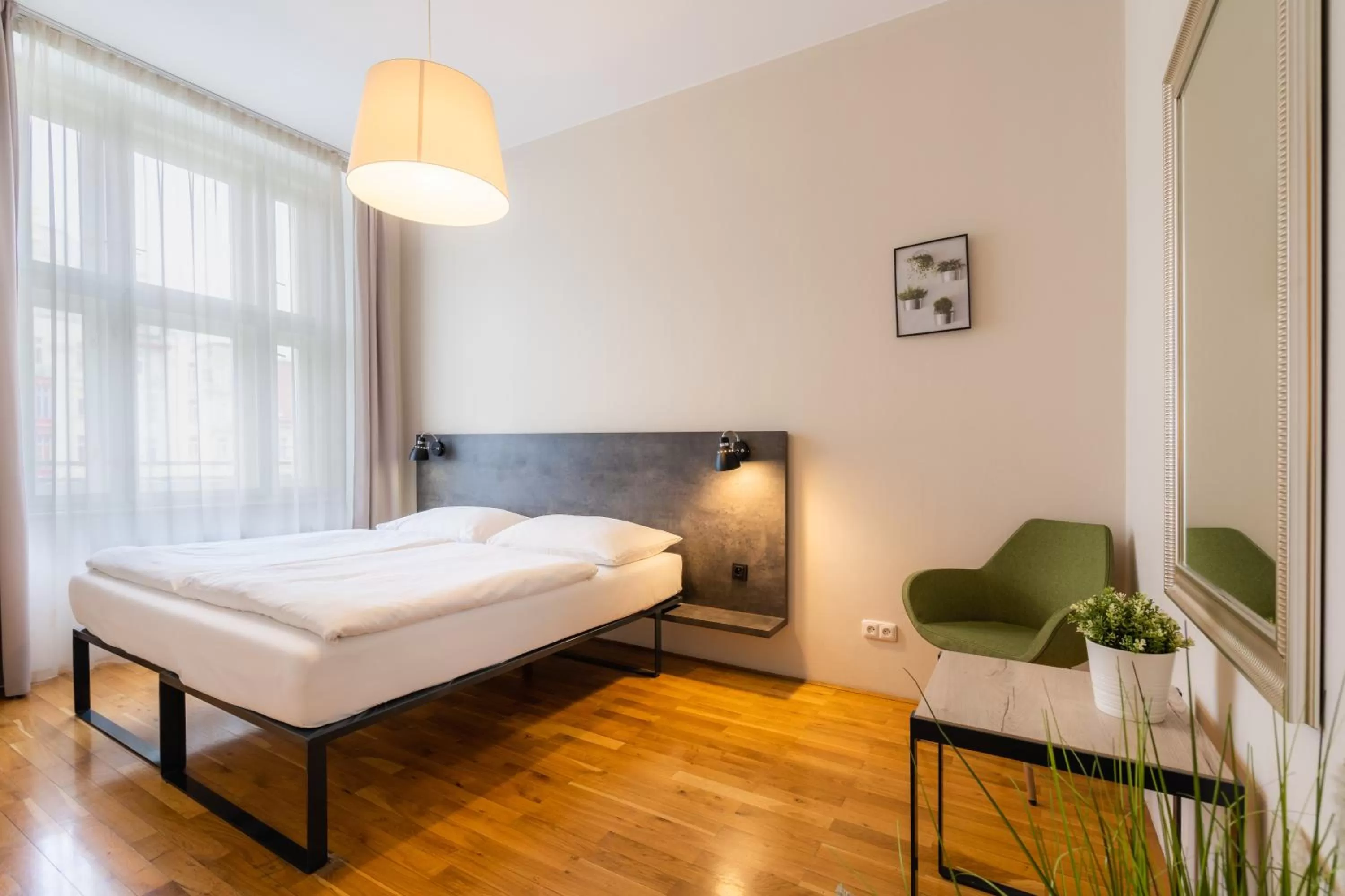 Bed in EA ApartHotel Melantrich