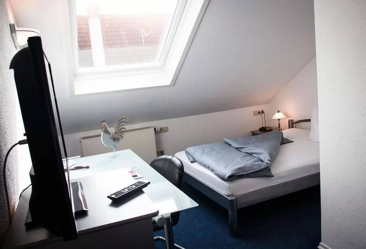 Photo of the whole room, Bed in Landhotel Weißer Hahn