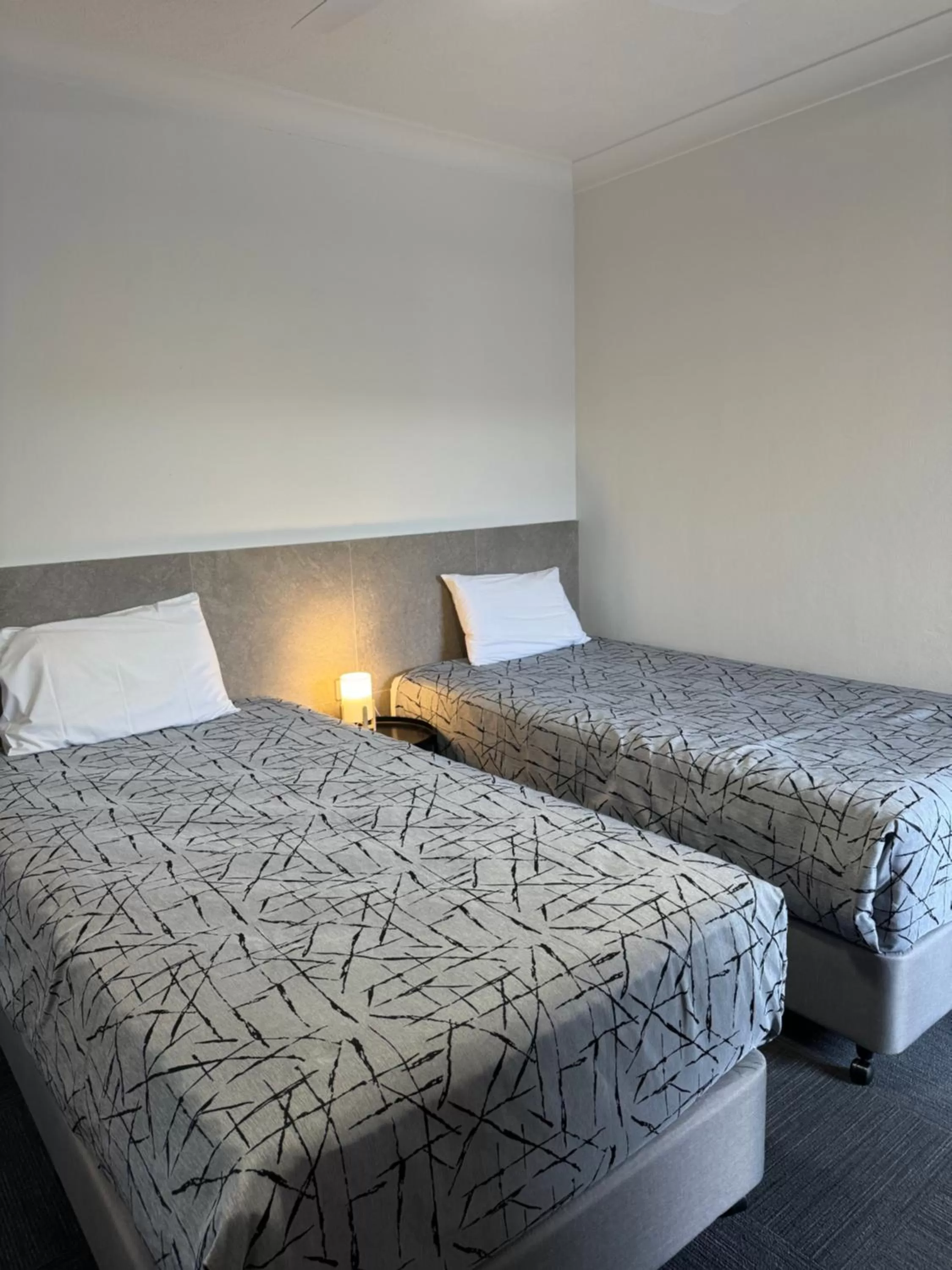 Bed in Longreach Motor Inn