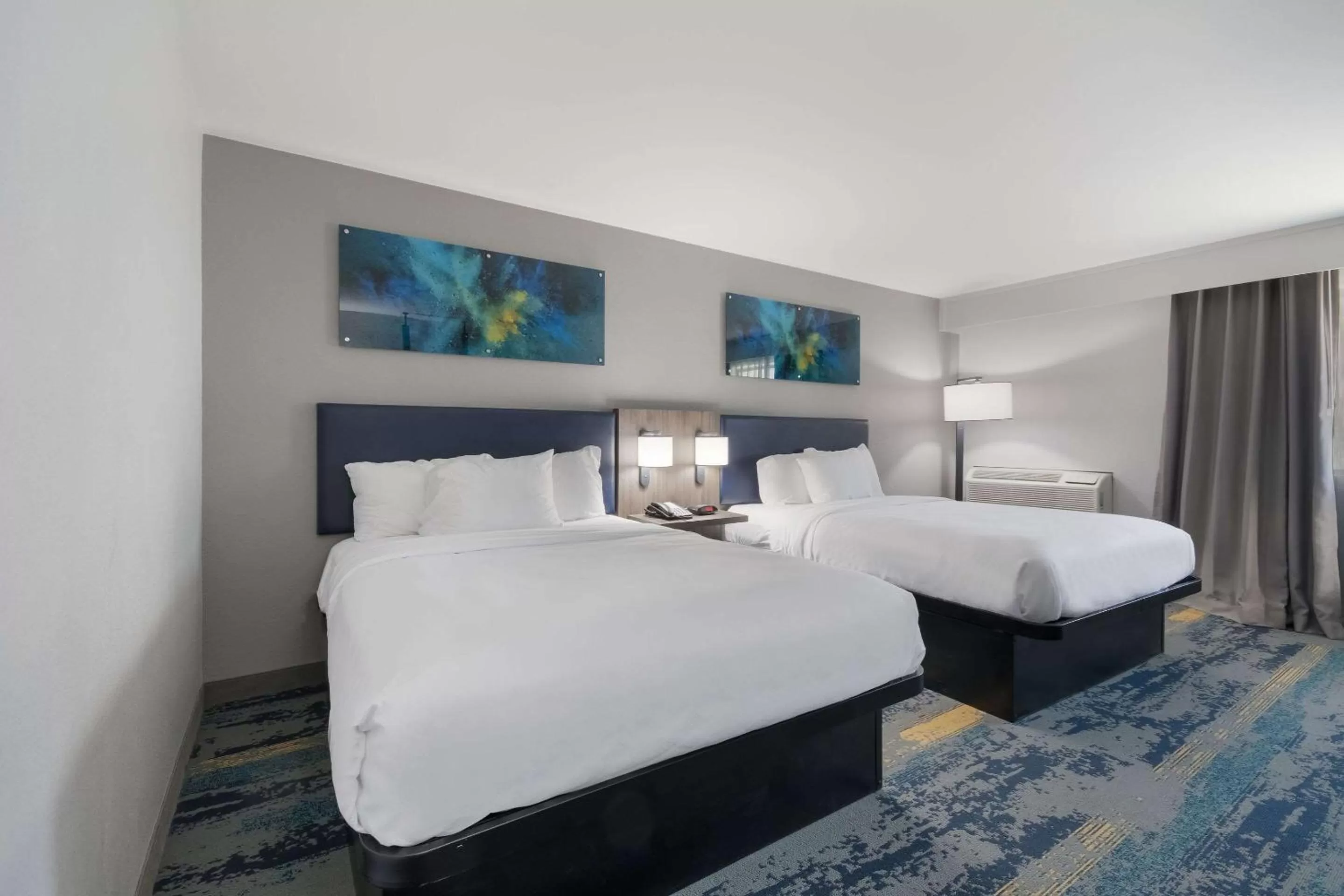 Bedroom in Clarion Pointe OKC Airport