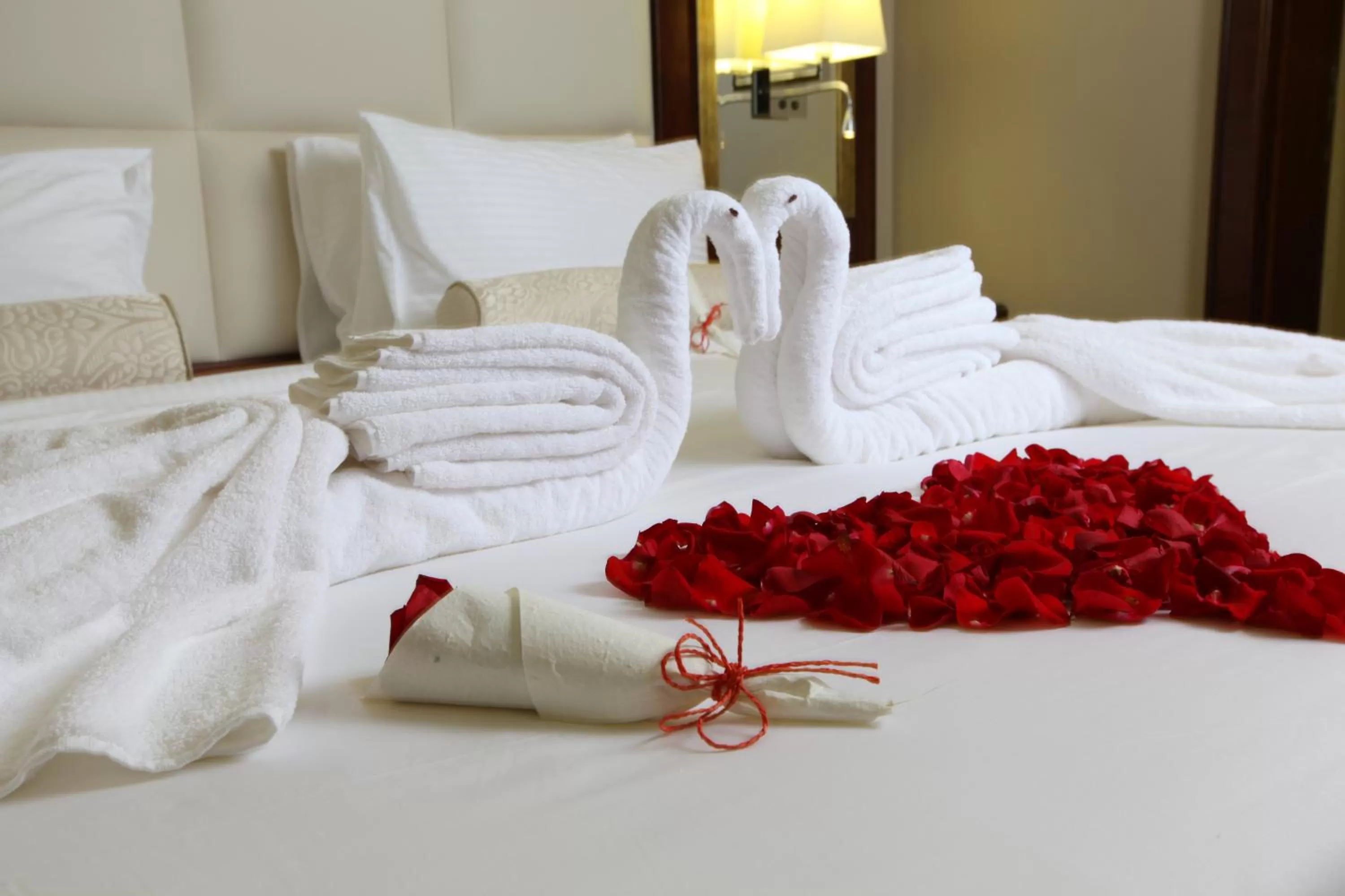 Bed in Western Lamar Hotel