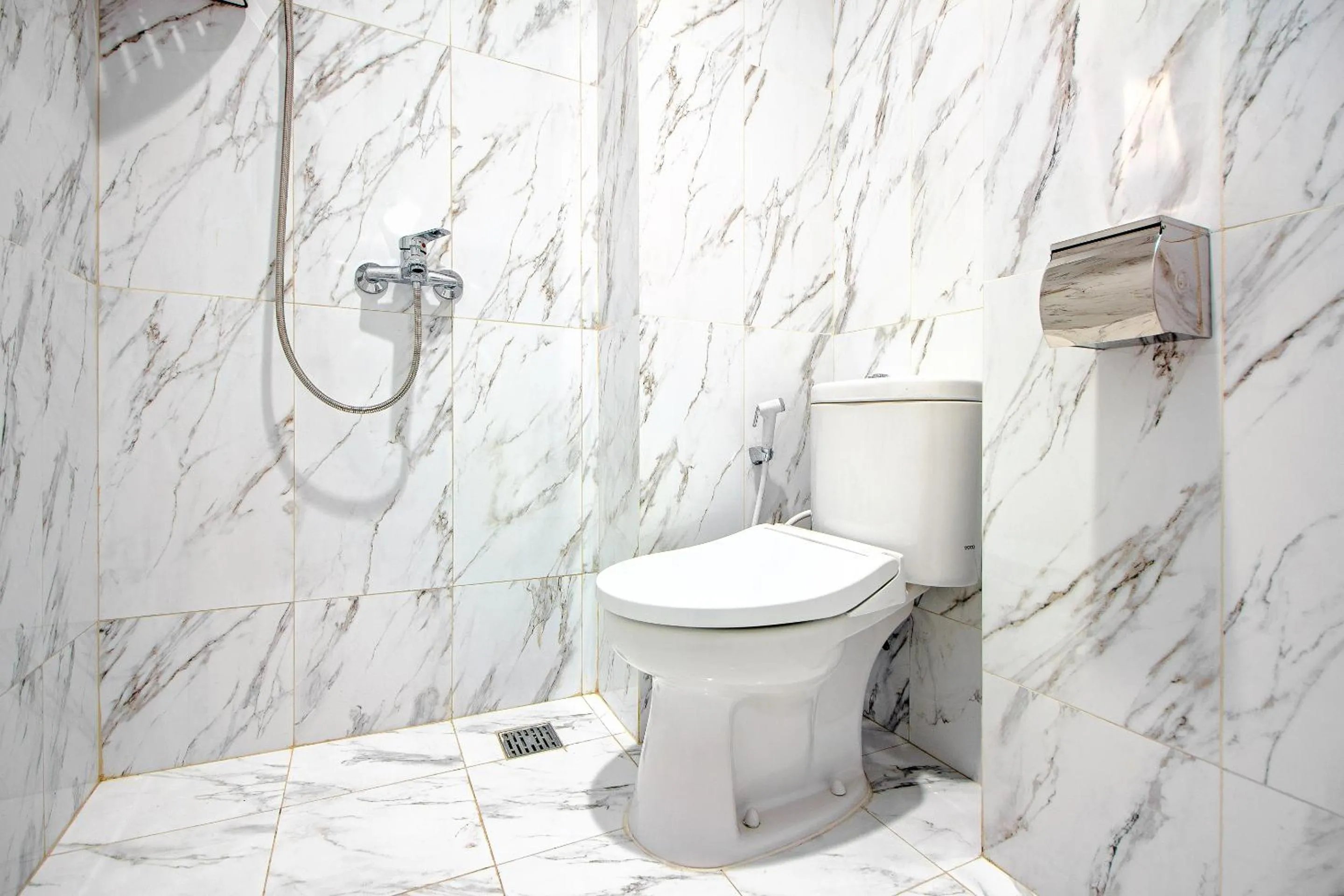 Bathroom in Hotel O 88 Exclusive Guesthouse