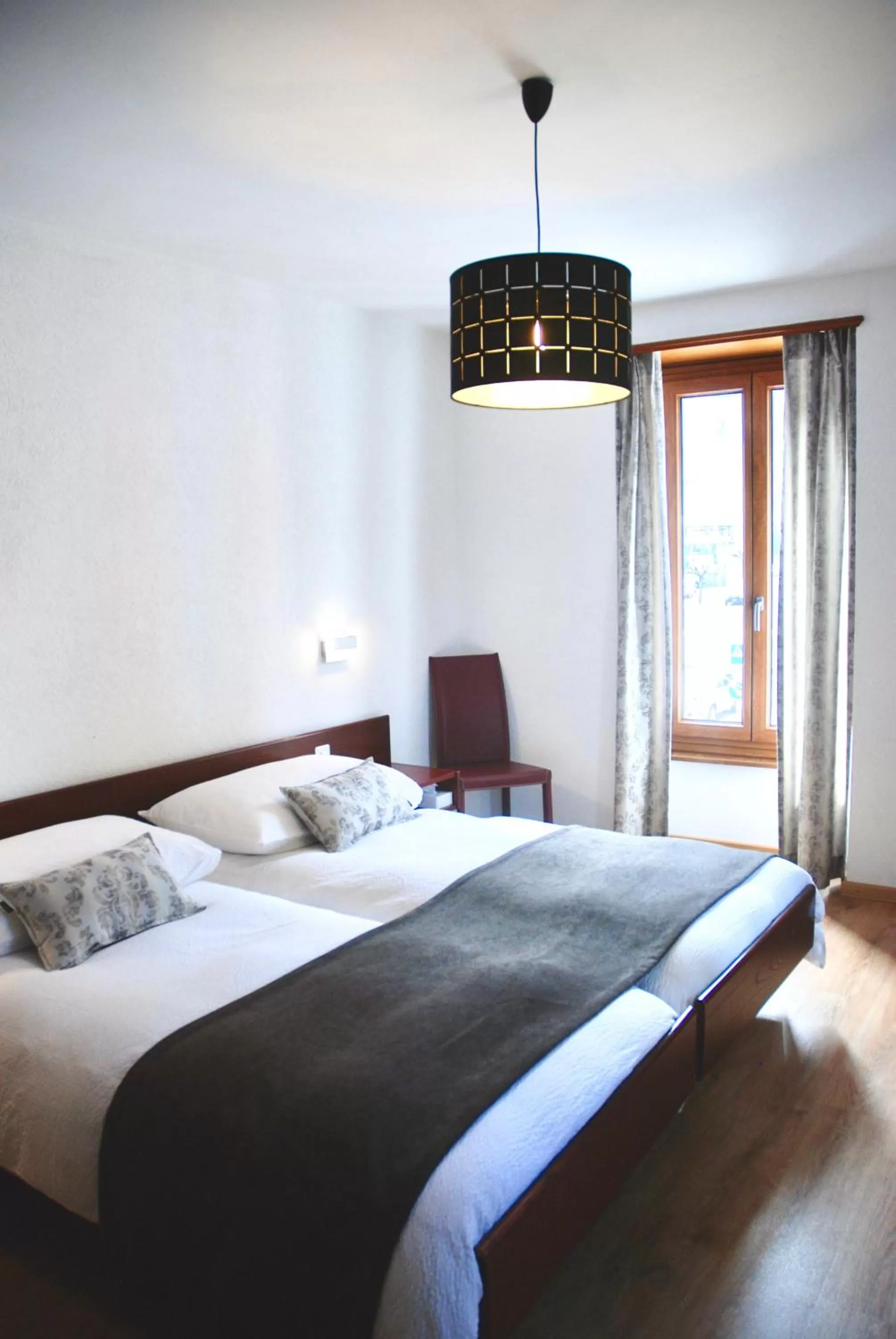 Bedroom, Bed in La Dent-du-Midi Hôtel & Restaurant