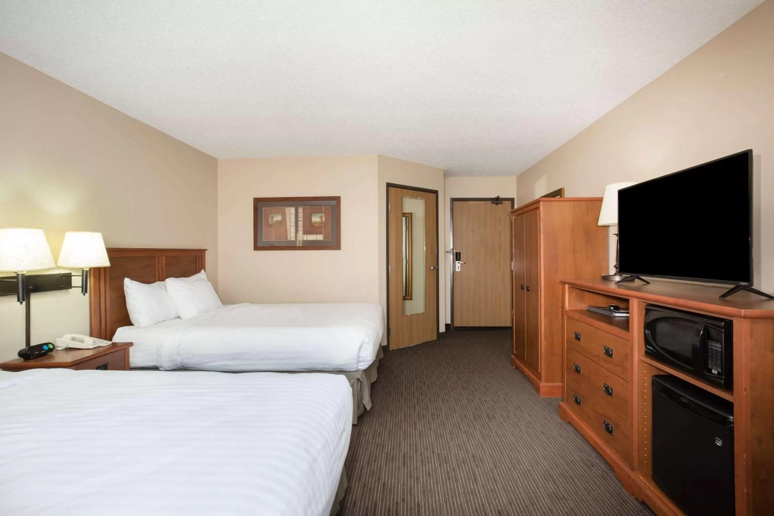 Photo of the whole room, Bed in AmericInn by Wyndham Sioux City