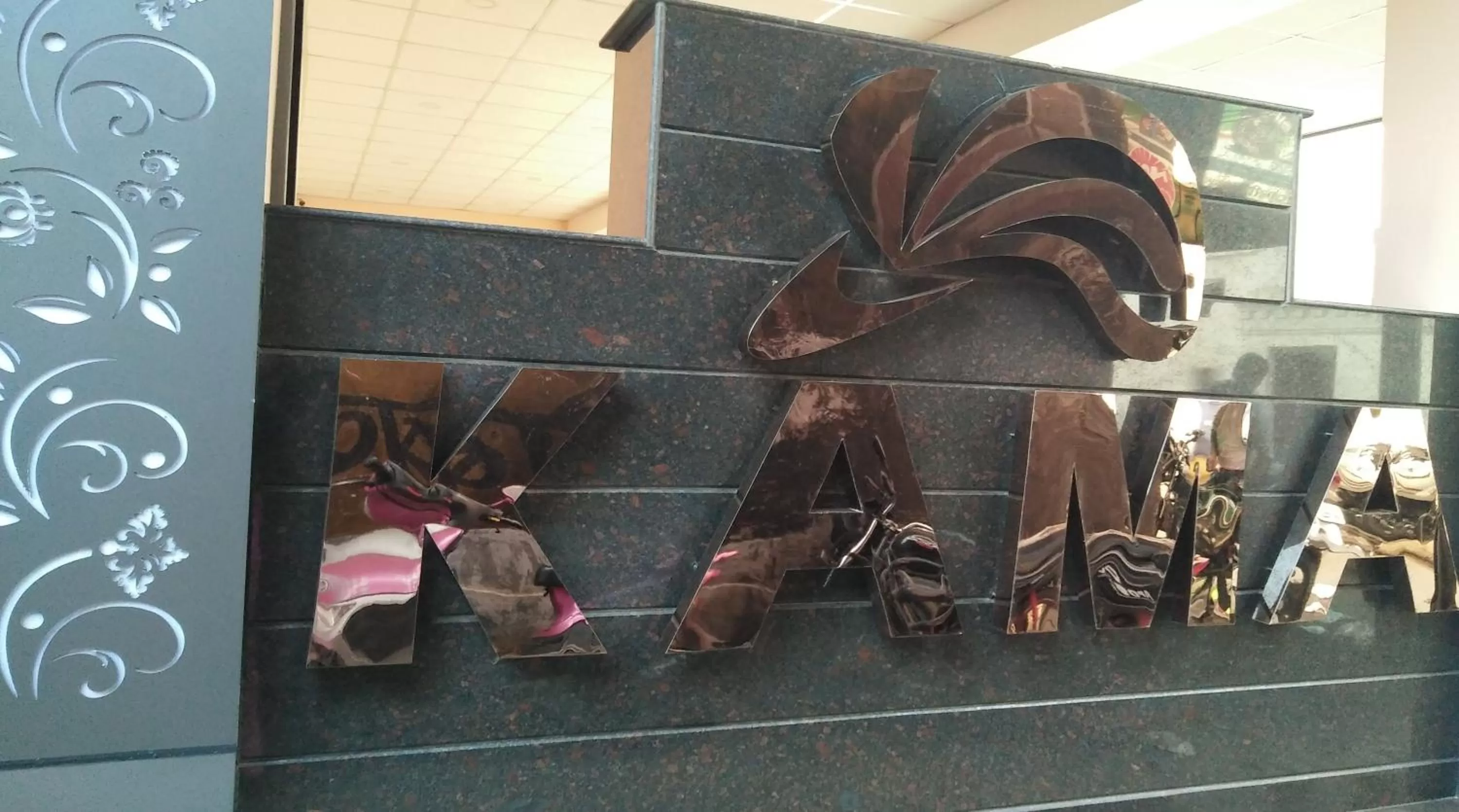 Property logo or sign in Hotel Kama International