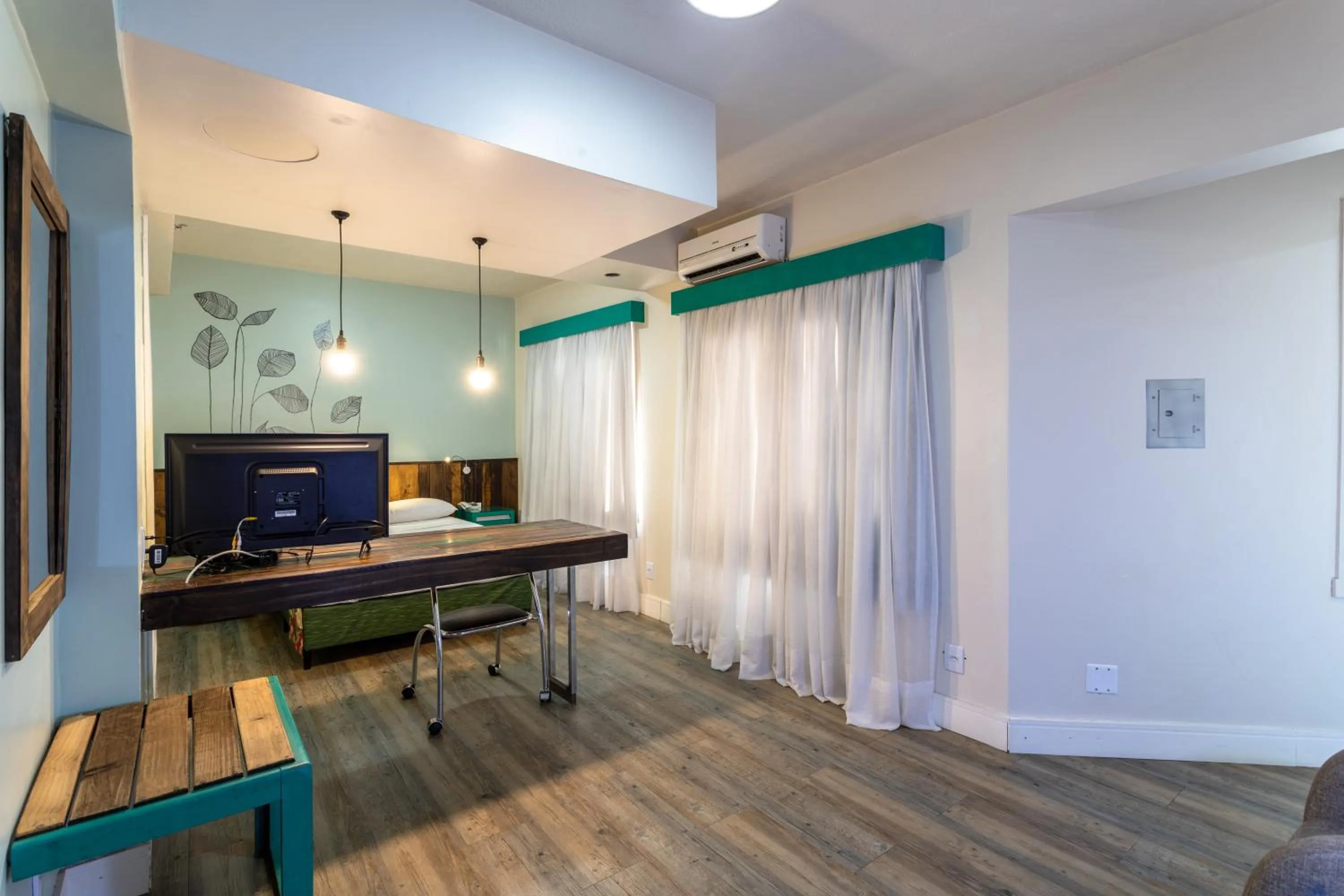 Bedroom, TV/Entertainment Center in Eko Residence Hotel