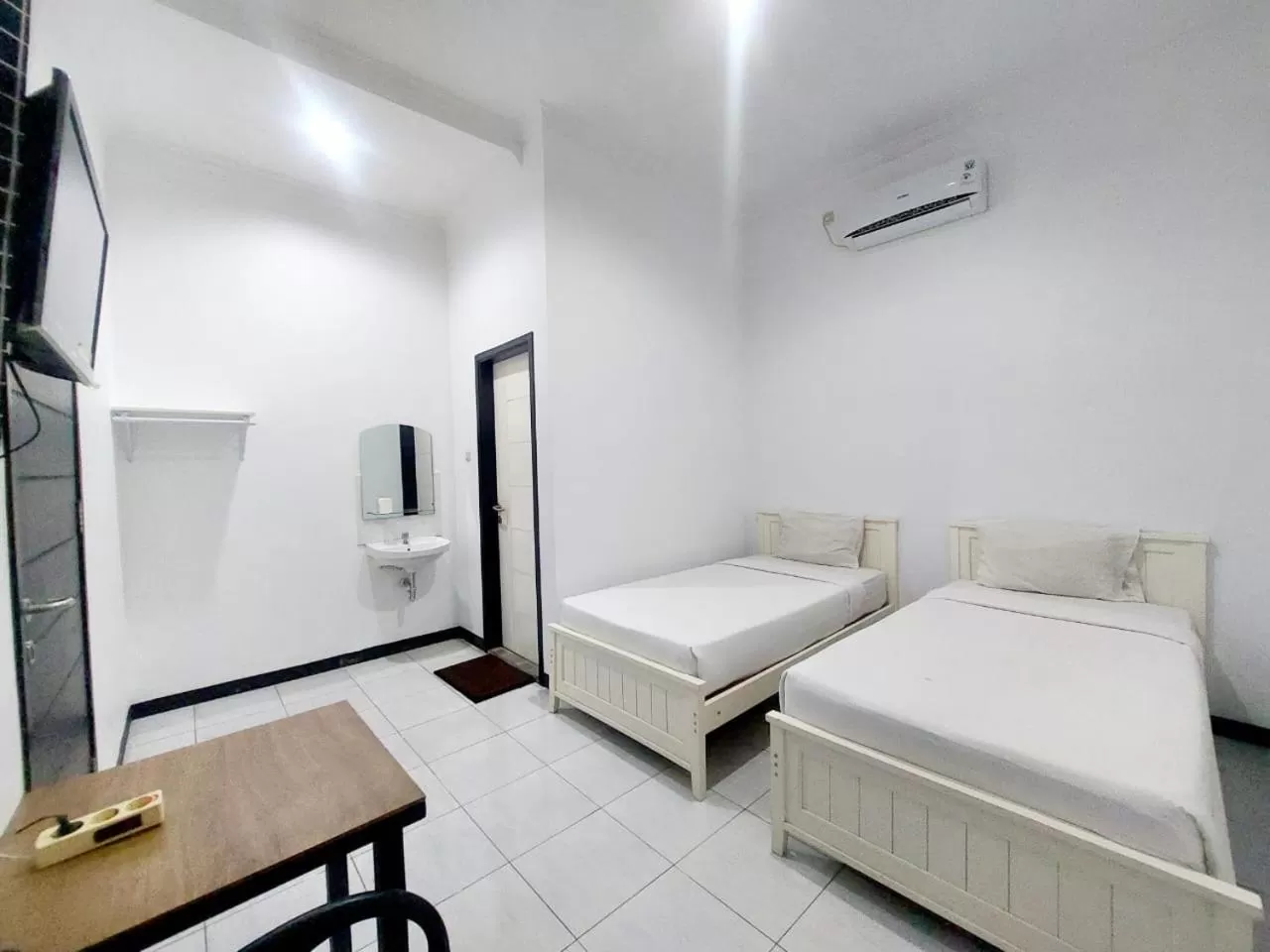 Bed in COZY STAY KUPANG