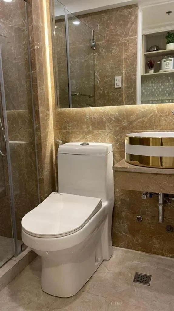 Toilet, Bathroom in Mpt Suites