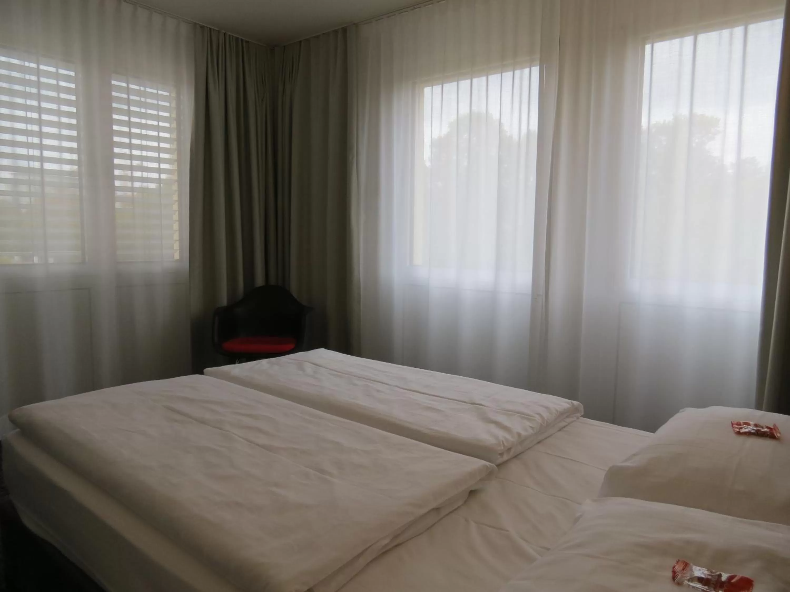 Photo of the whole room, Bed in Comfor Hotel Ulm City