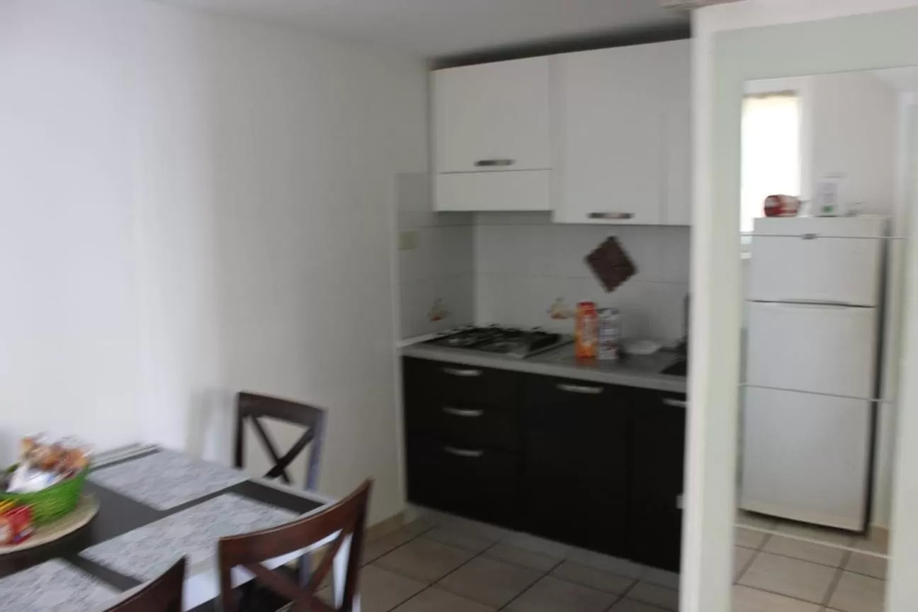 Kitchen/Kitchenette in Relais Maria Luisa Locazione turistica di Simona Capaccio