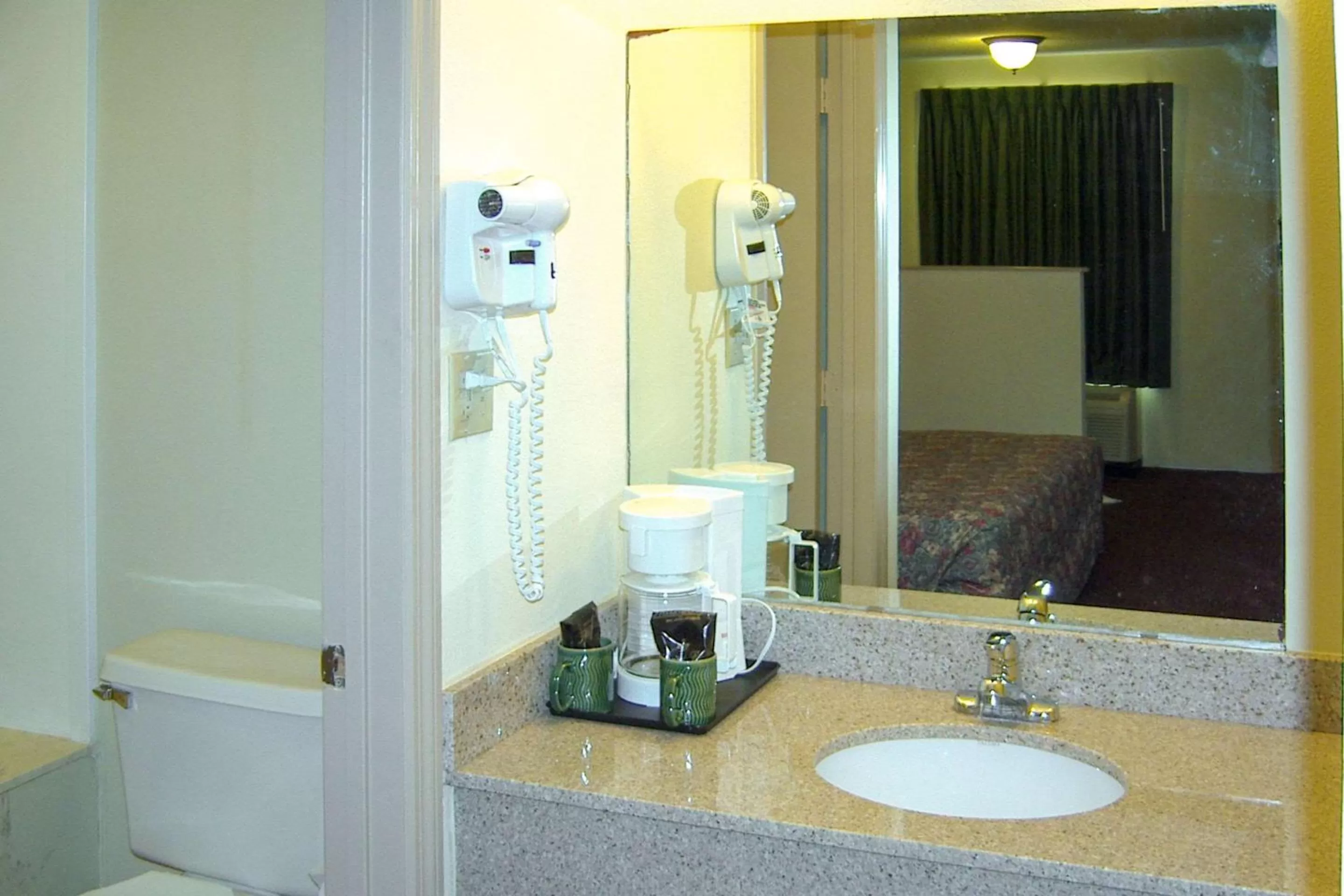 Bathroom in Travelers Inn & Suites