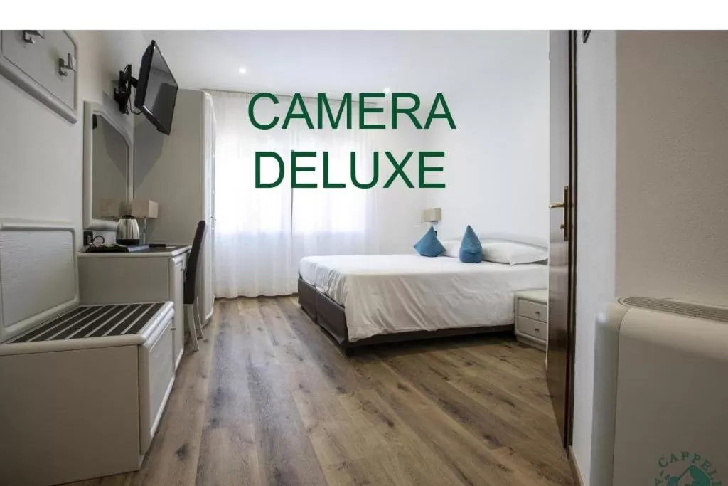 Bed in Albergo Cappello e Cadore