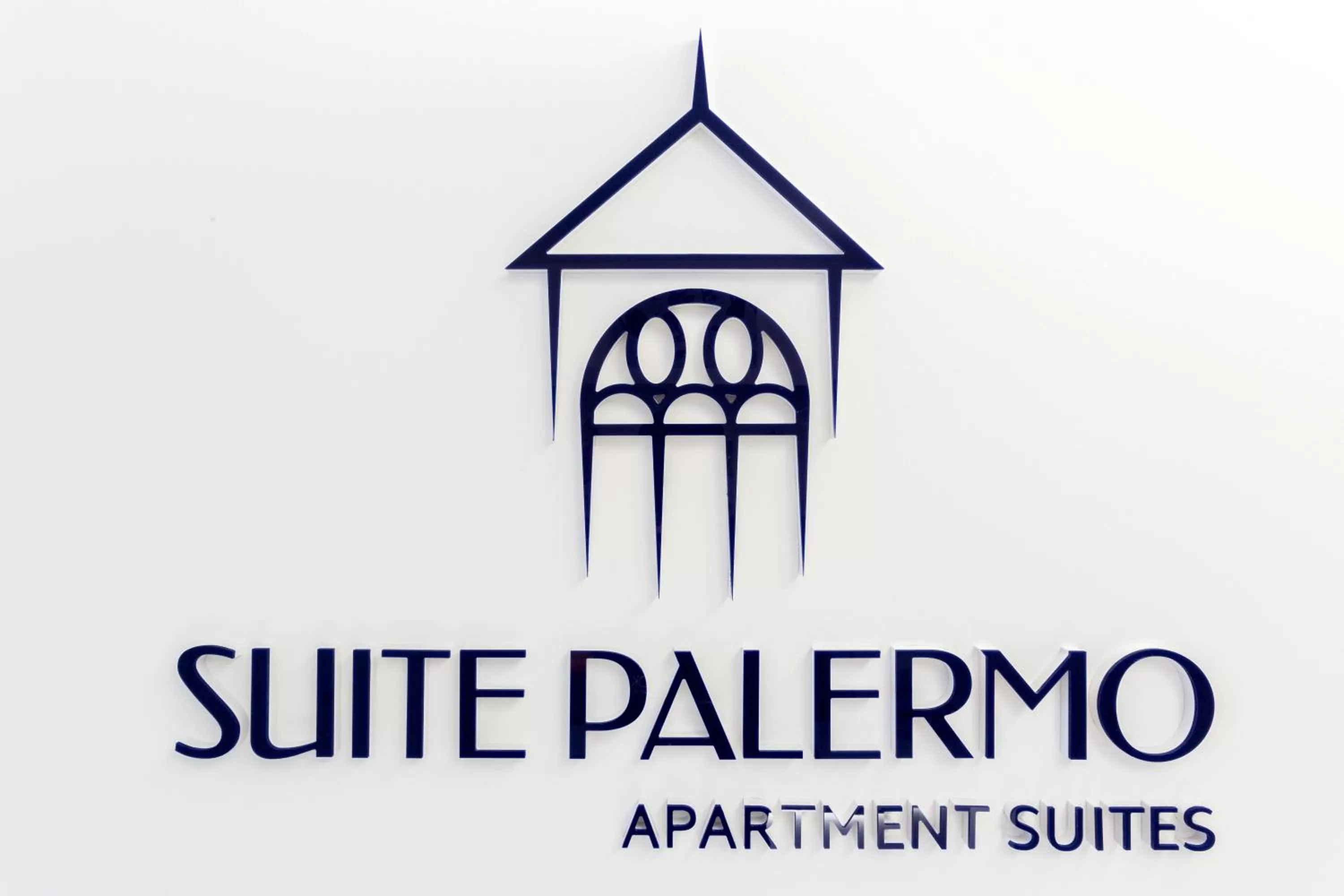 Property logo or sign in Suite Palermo Apartment