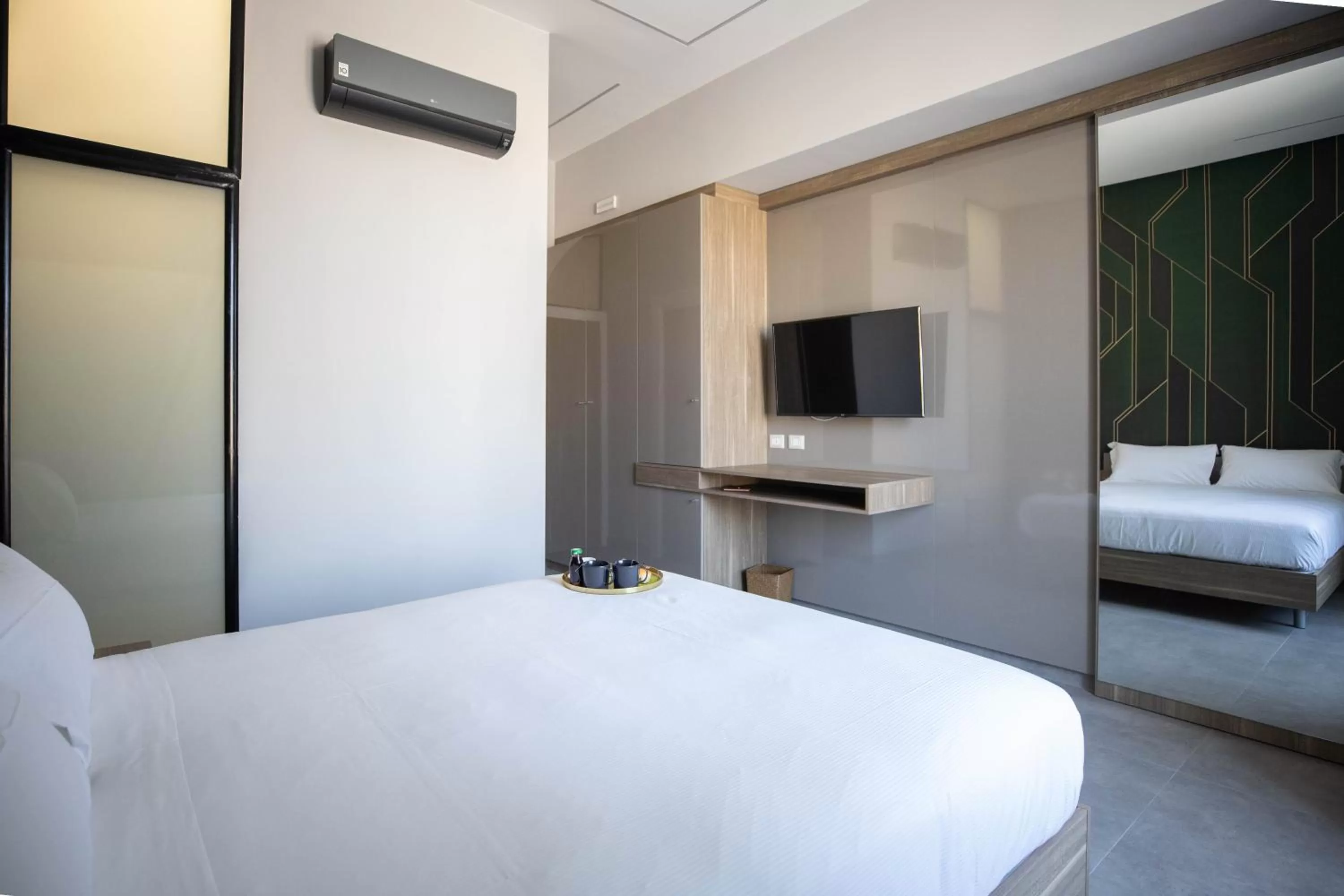 Bed in L'élégant BOUTIQUE ROOMS NAPLES