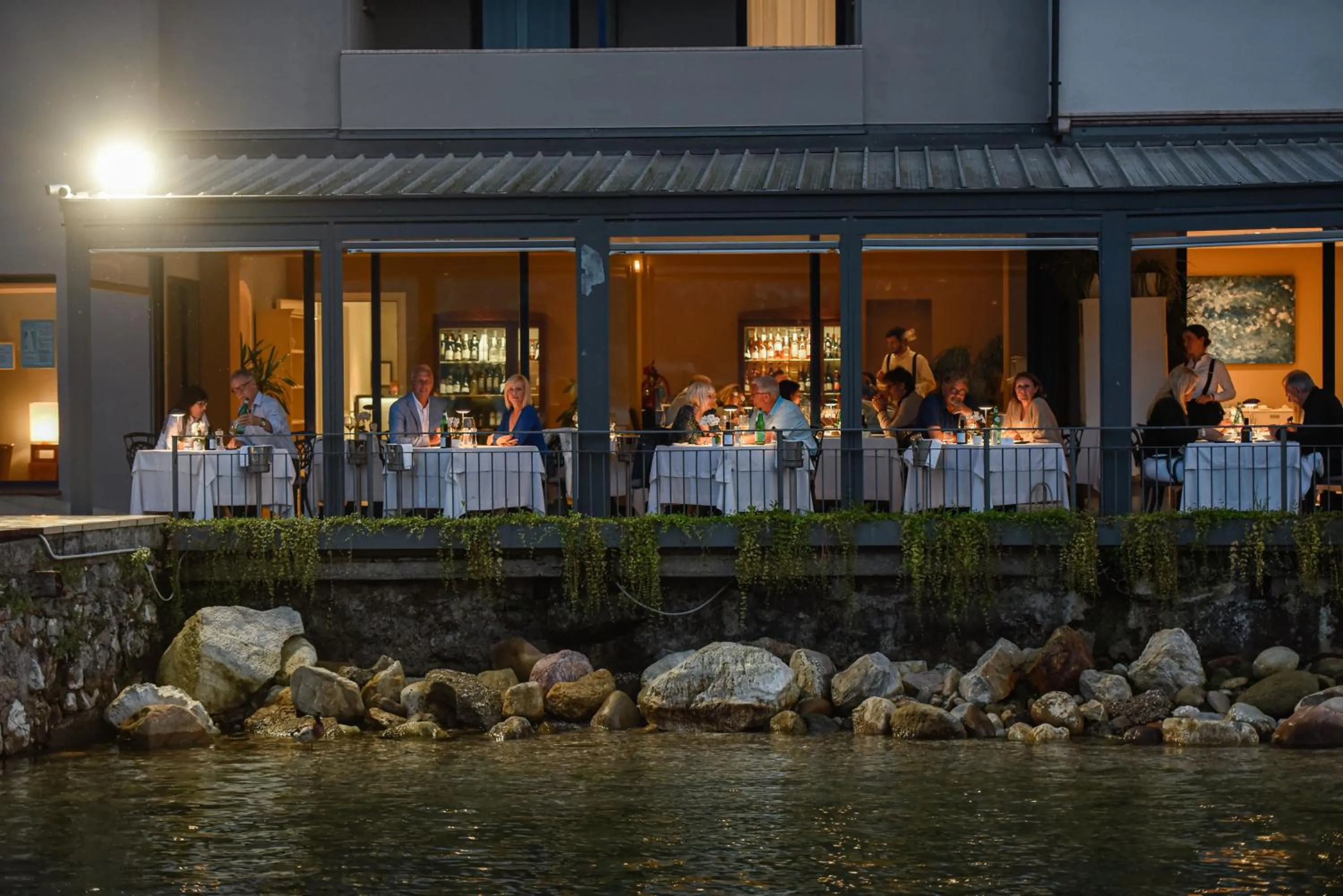 Property building in Bella Hotel & Restaurant with private dock for mooring boats