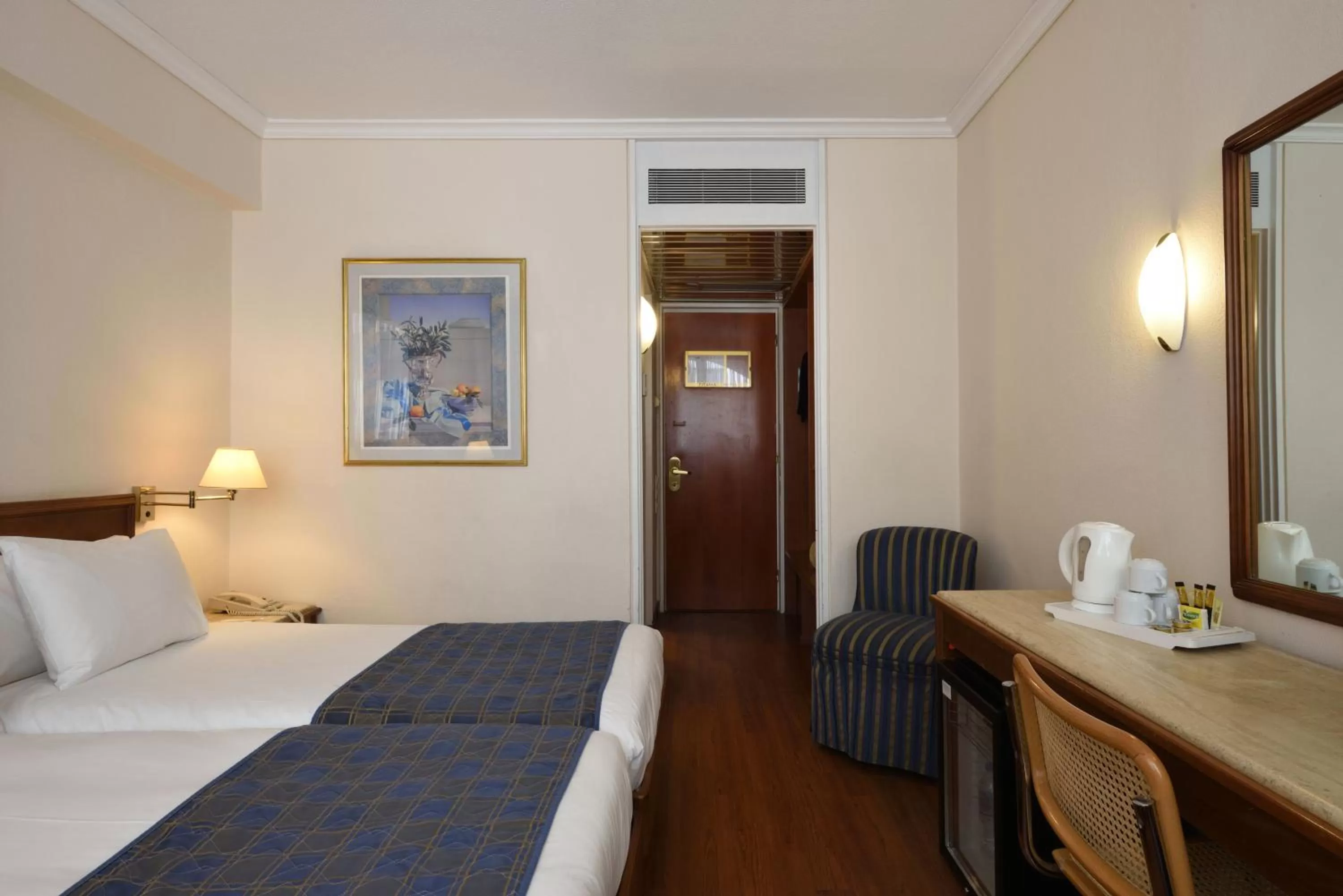 Bed in Titania Hotel