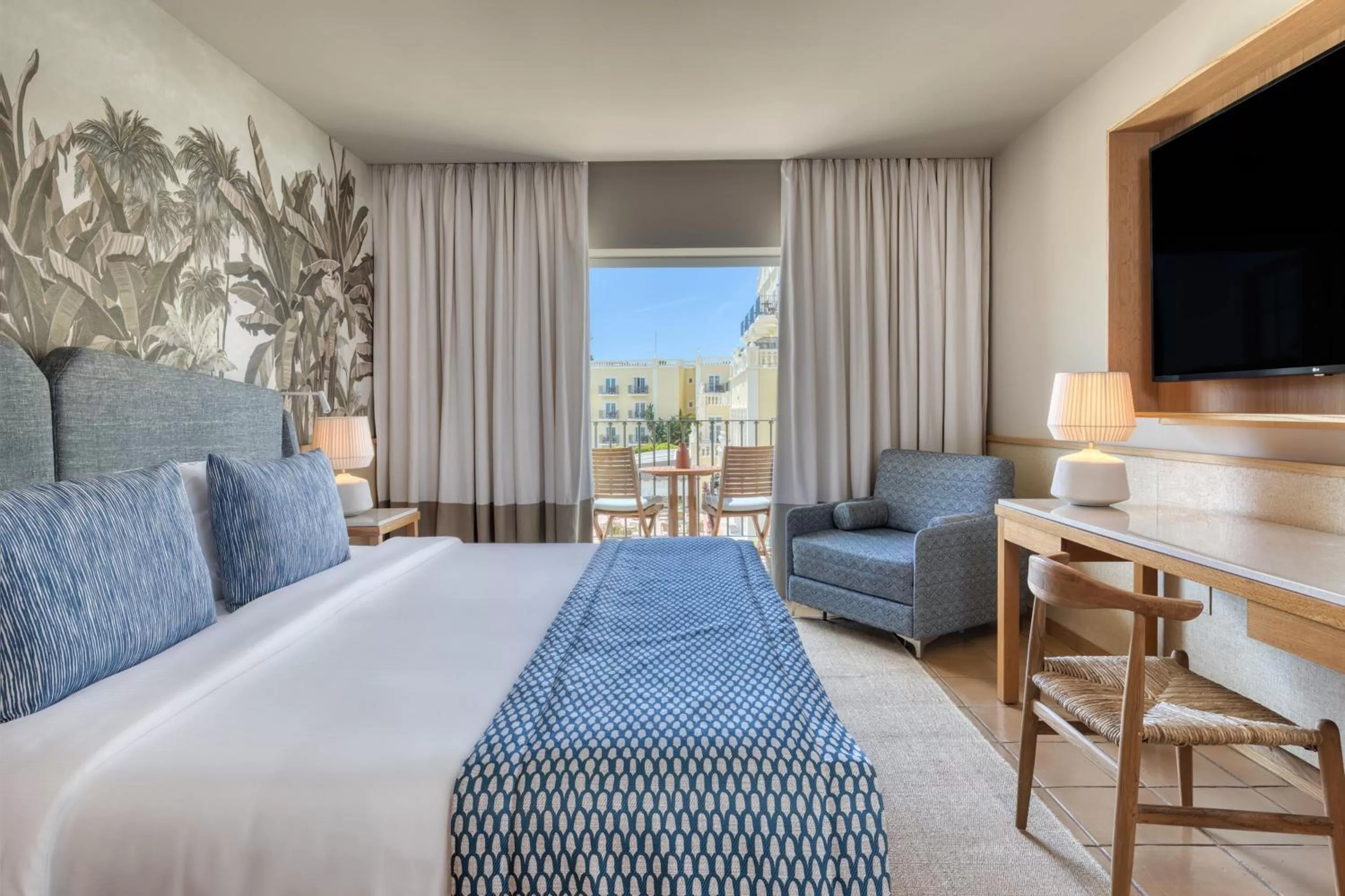 Photo of the whole room, Bed in Domes Lake Algarve, Autograph Collection