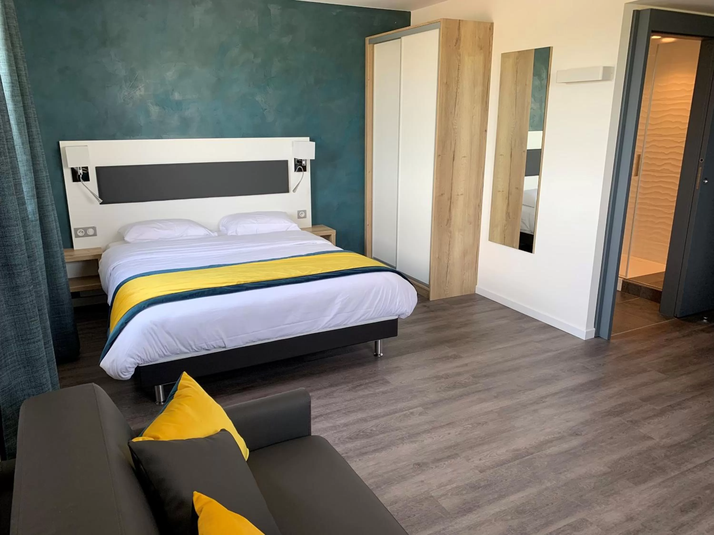 Bed in ATOLON PARK HOTEL