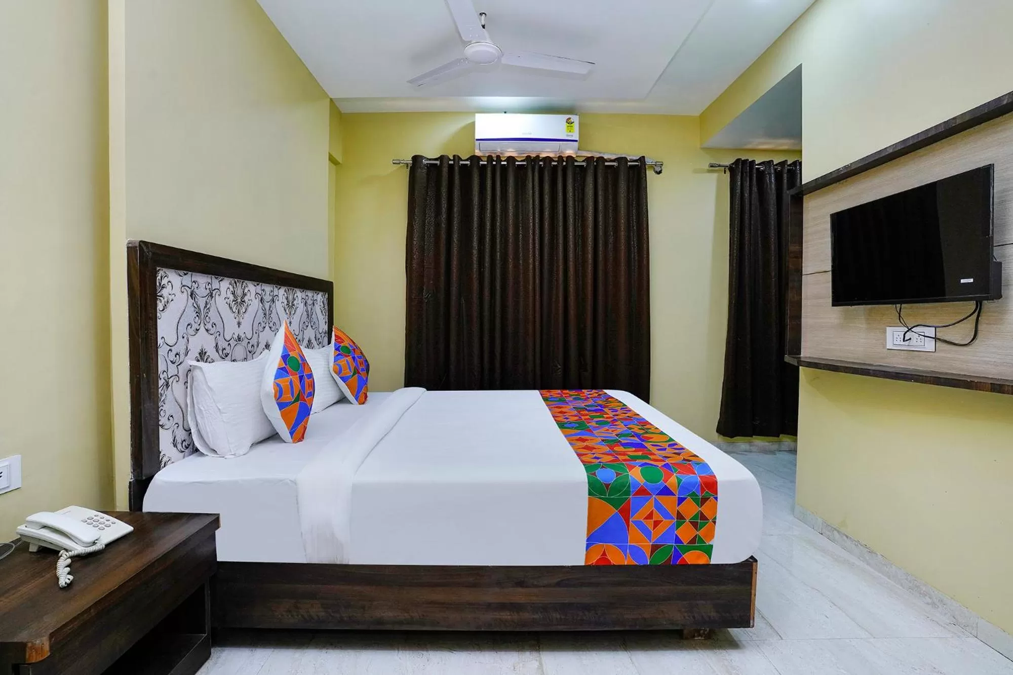 Bed in FabHotel Bhiwandi Palace