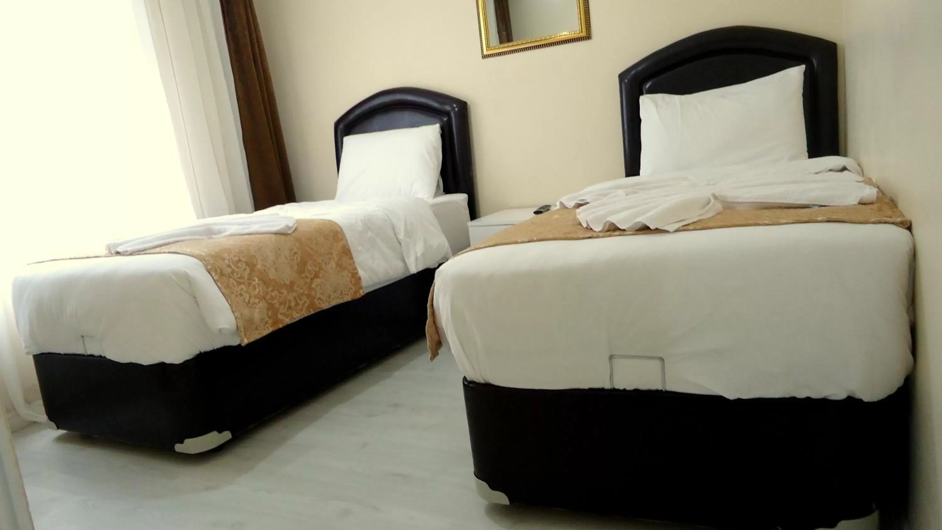 Photo of the whole room, Bed in Tolga Hotel