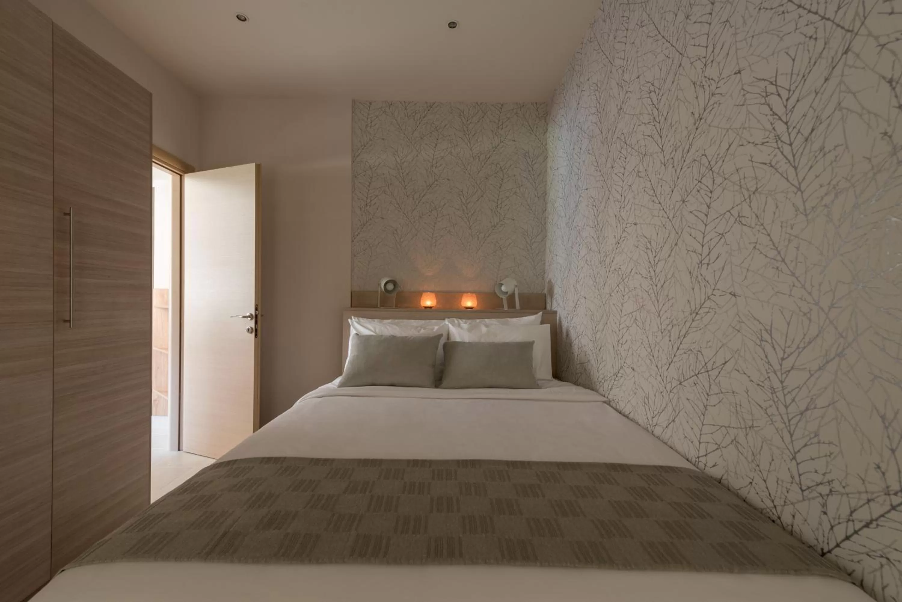 Bed in 12 Keys Athens Apartments