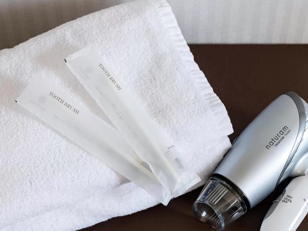 Bed in Toyama Town Hotel