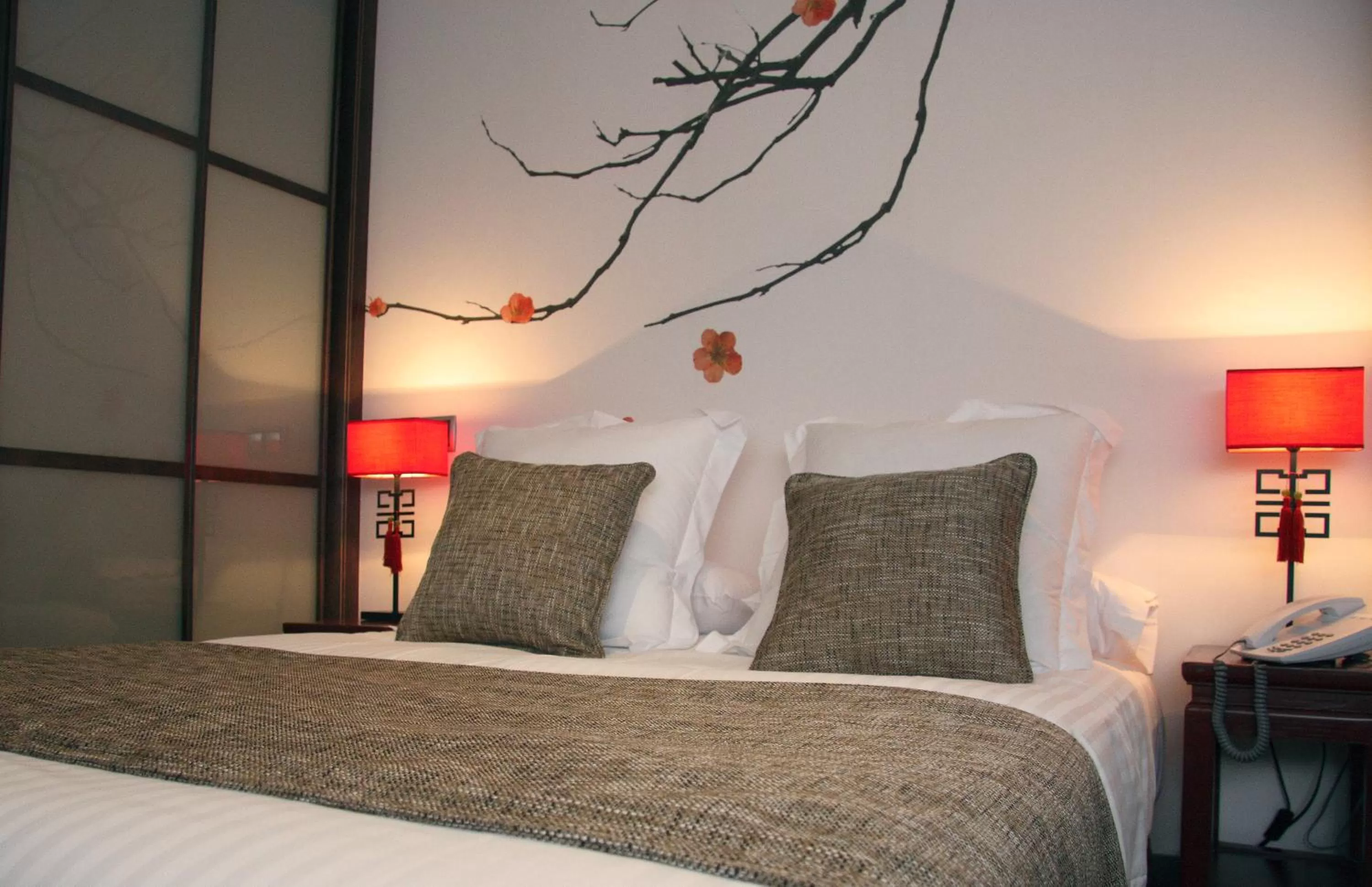 Bed in Le Petit Boutique Hotel
