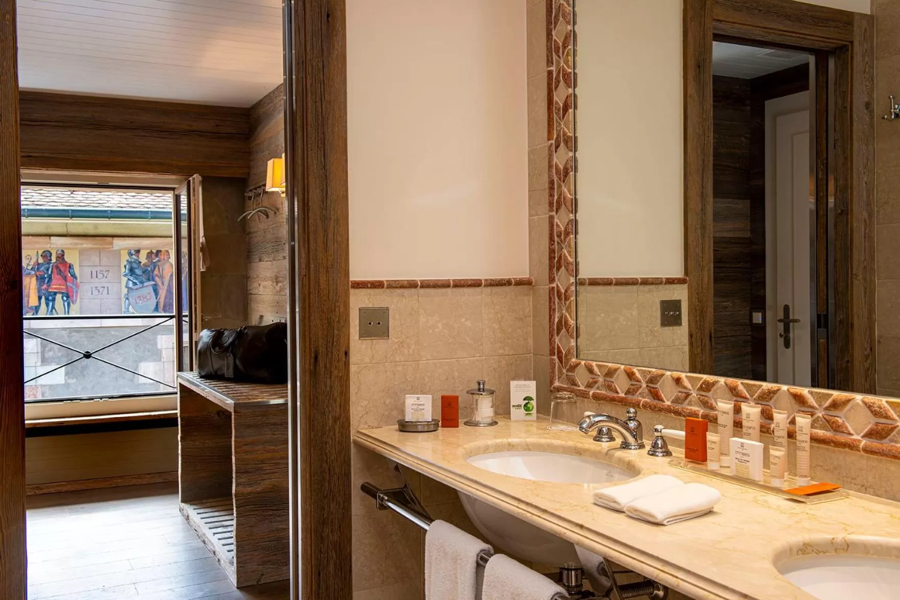 Bathroom in Hôtel Les Armures